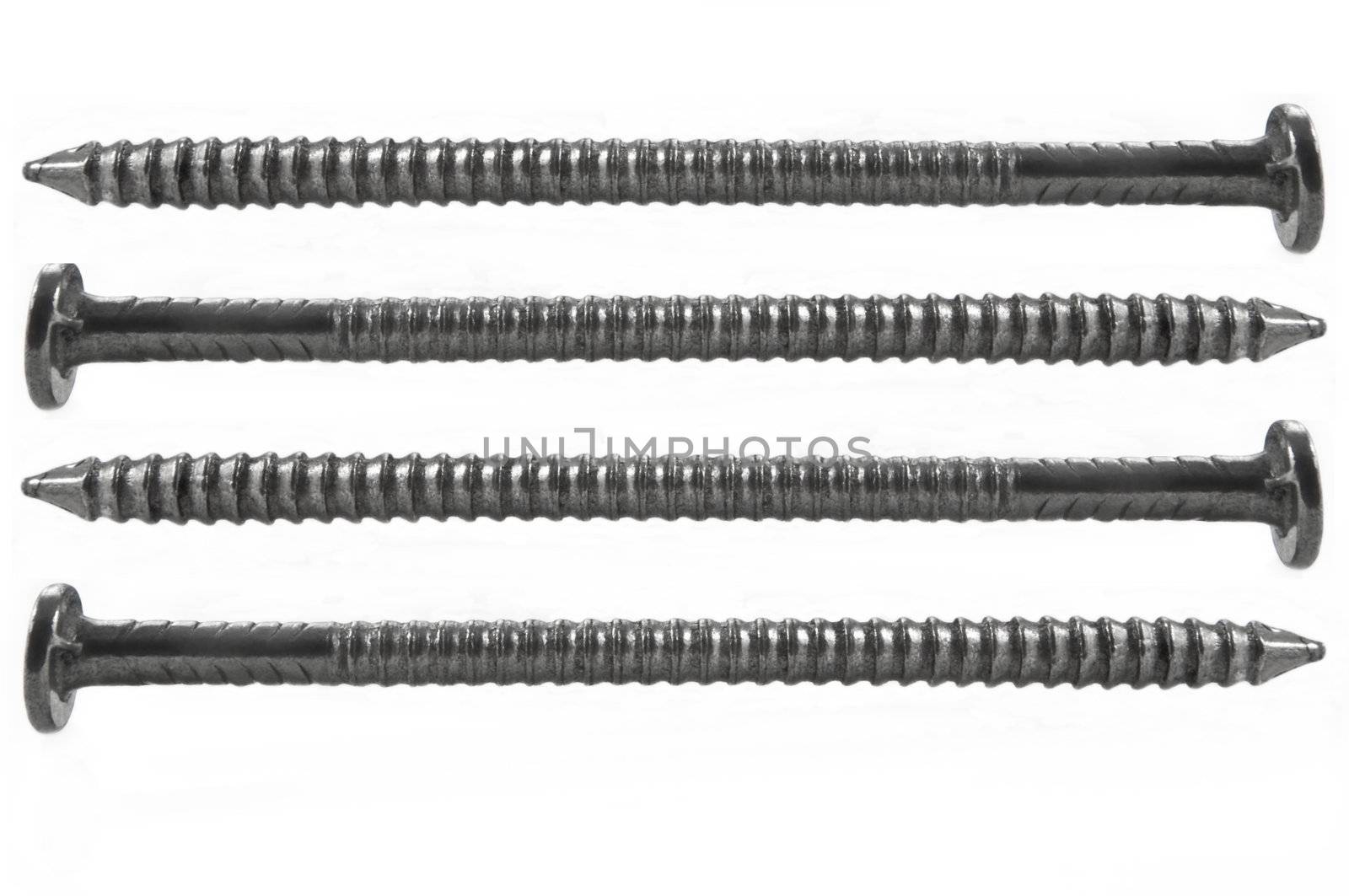 Four steel nails arranged horizontally and over white