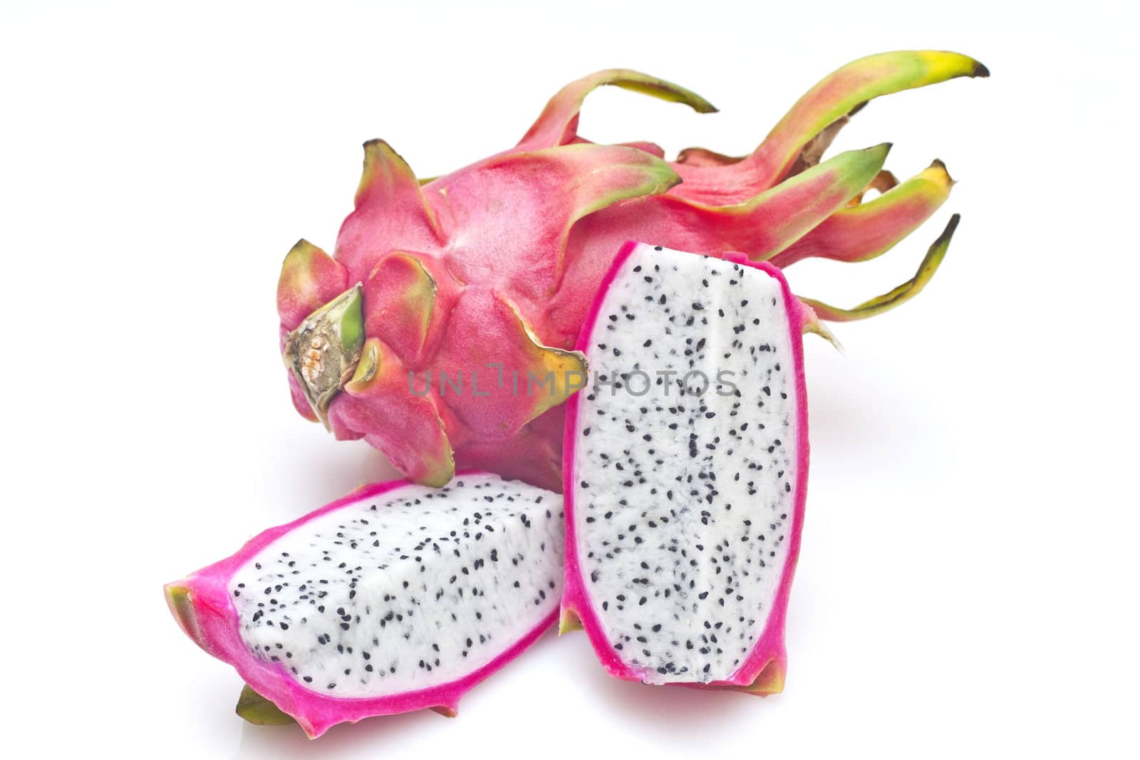 Vivid and vibrant dragon fruit isolated on white background