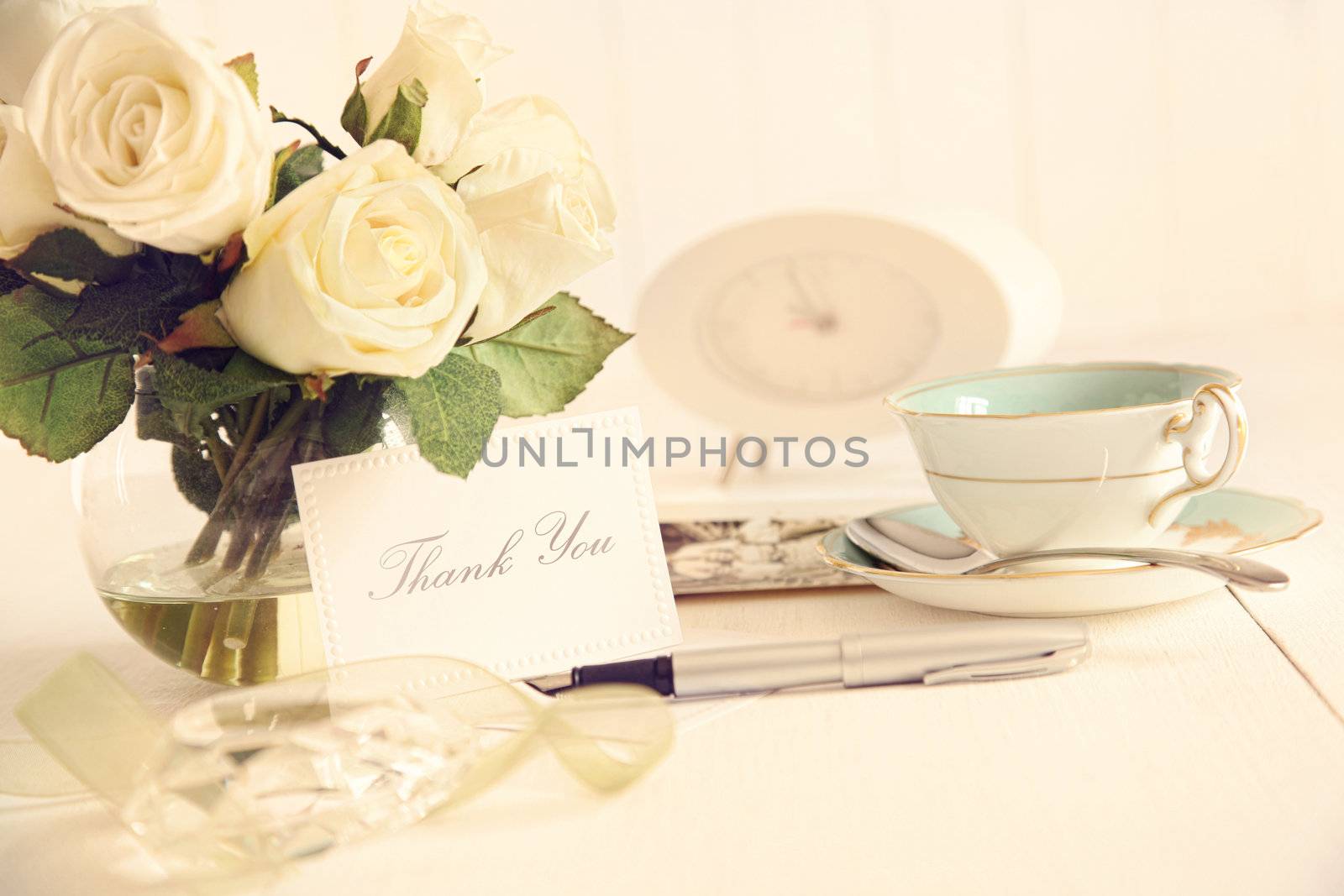 Thank you note on table with nostalgic romantic feel