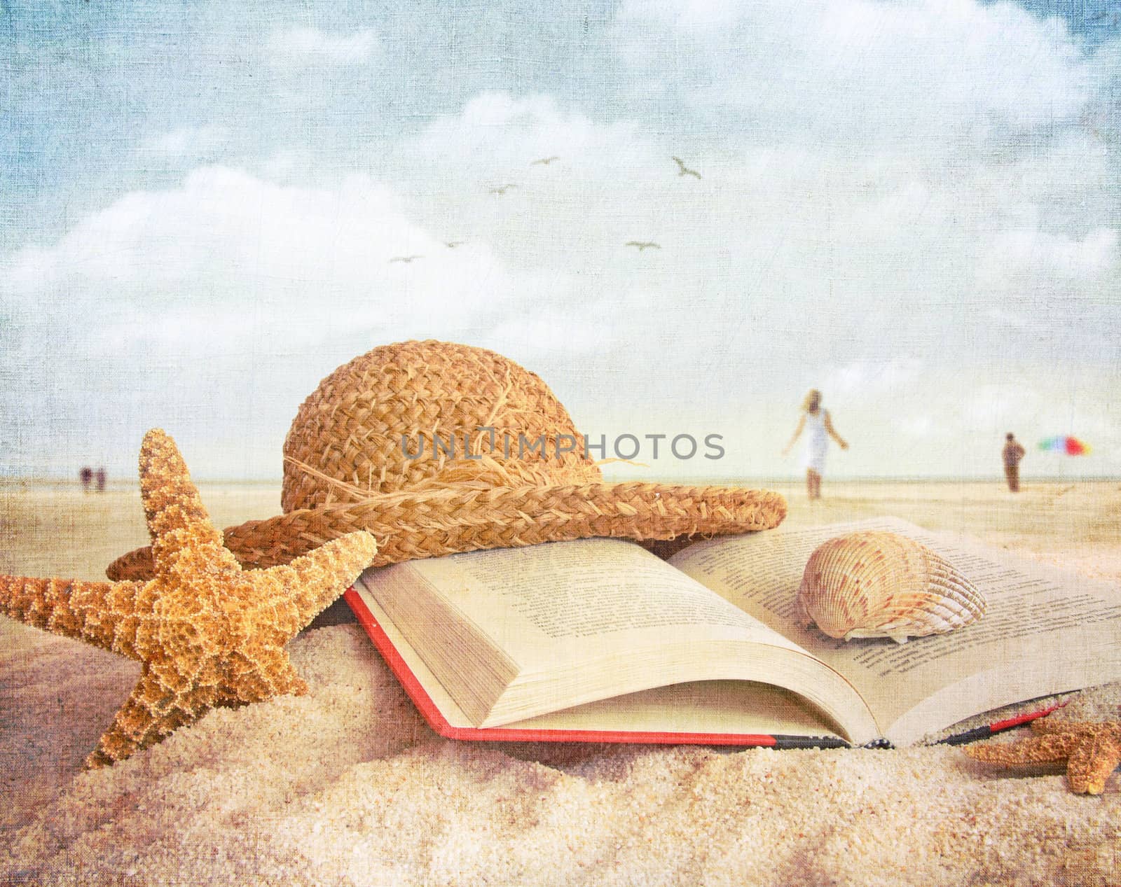 Straw hat , book and seashells in the sand by Sandralise