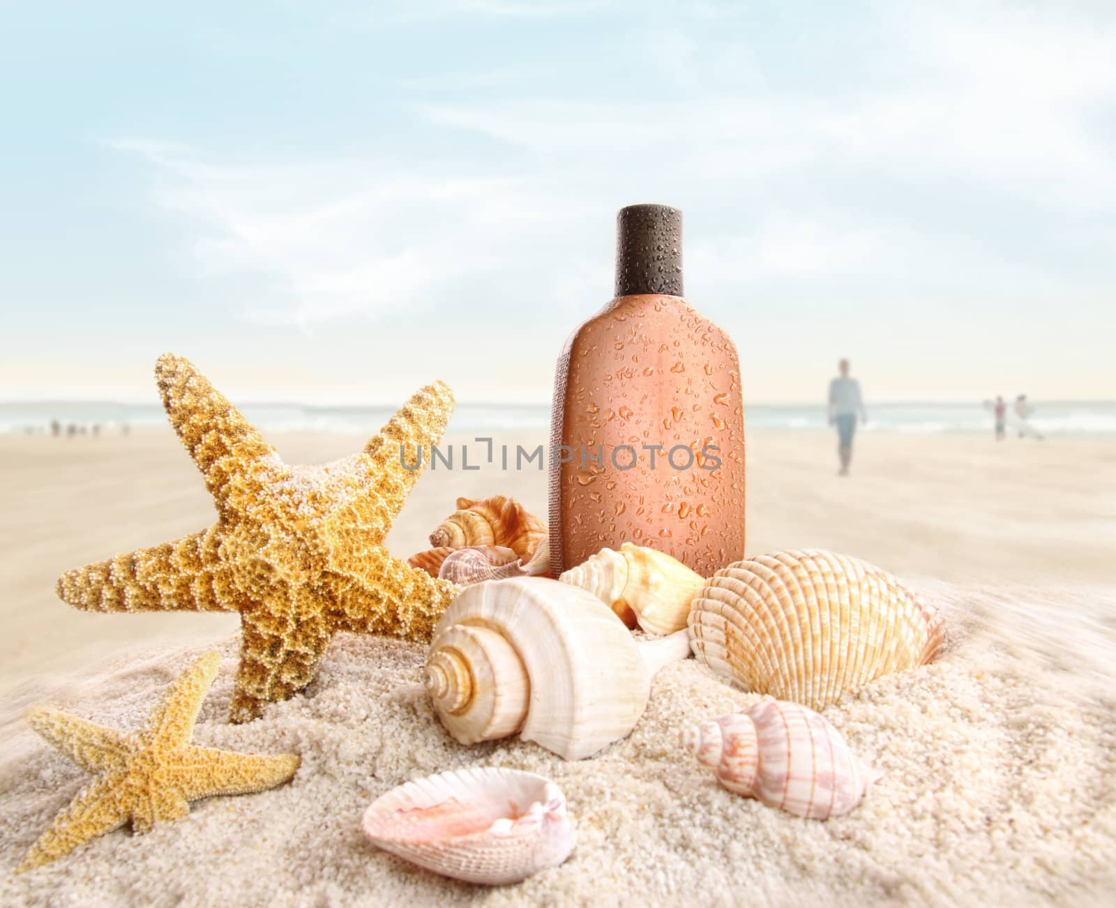 Suntan lotion and seashells on the beach by Sandralise