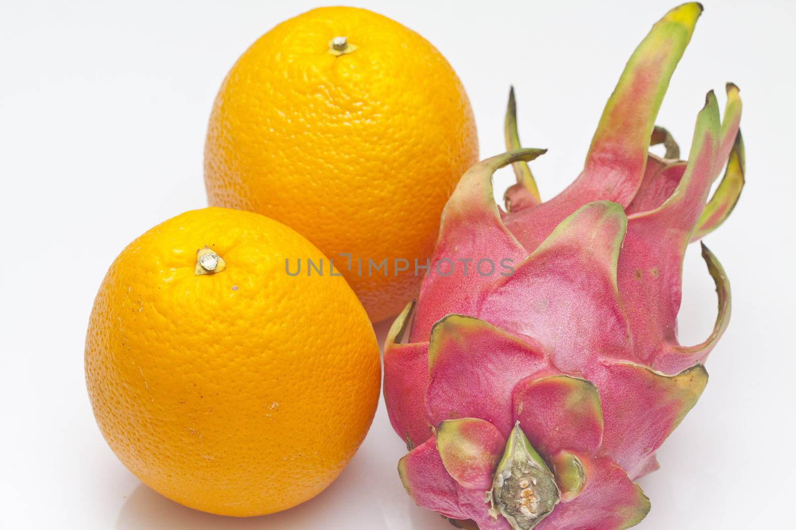 Dragon fruit and oranges