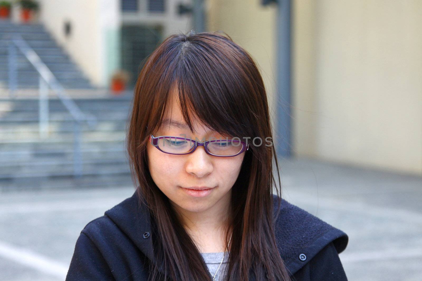 Asian girl smiling in school