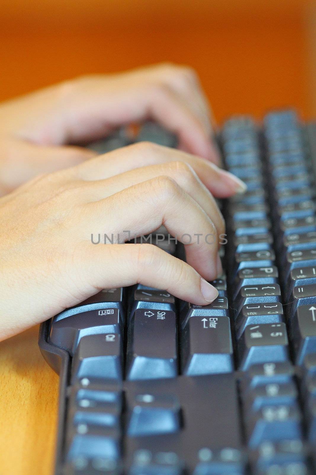 Human hands using computer