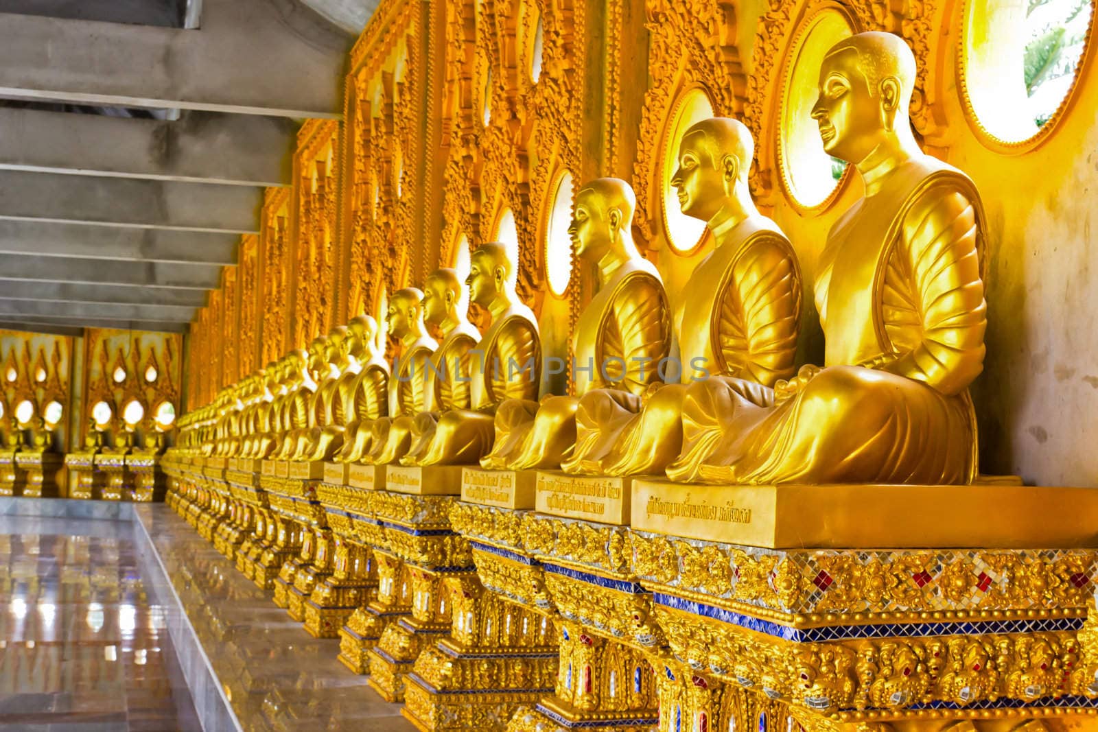 Buddha golden image in row