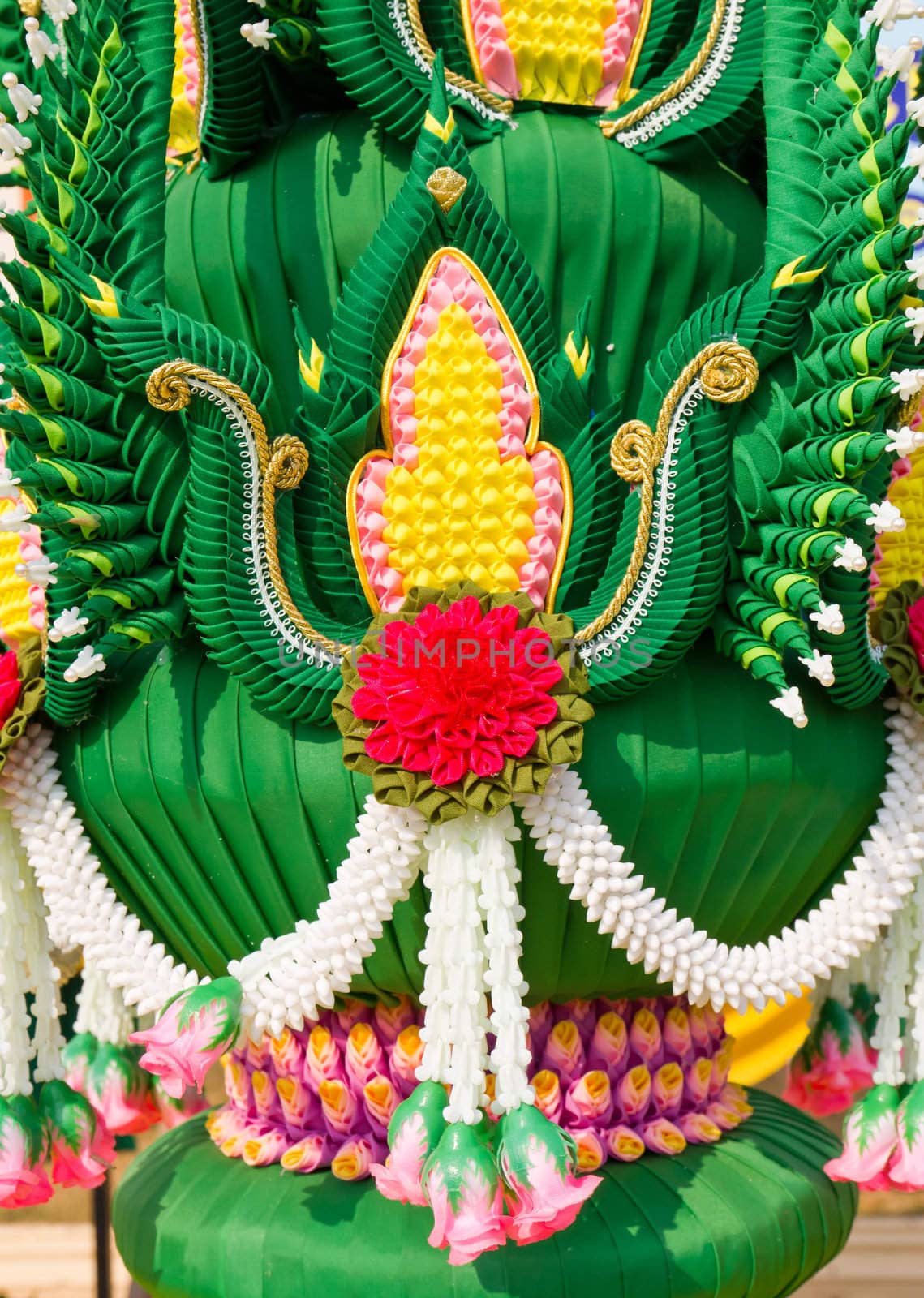 Garland with real and fake flowers with vivid colors