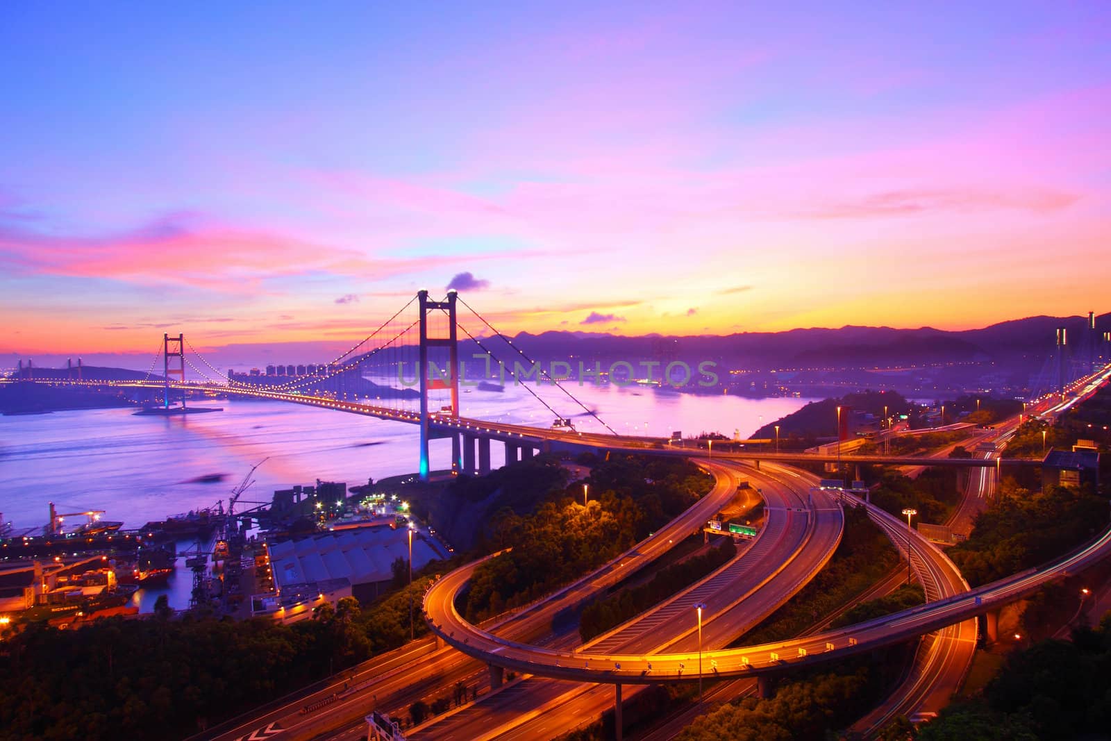 Tsing Ma Bridge in Hong Kong at sunset time by kawing921