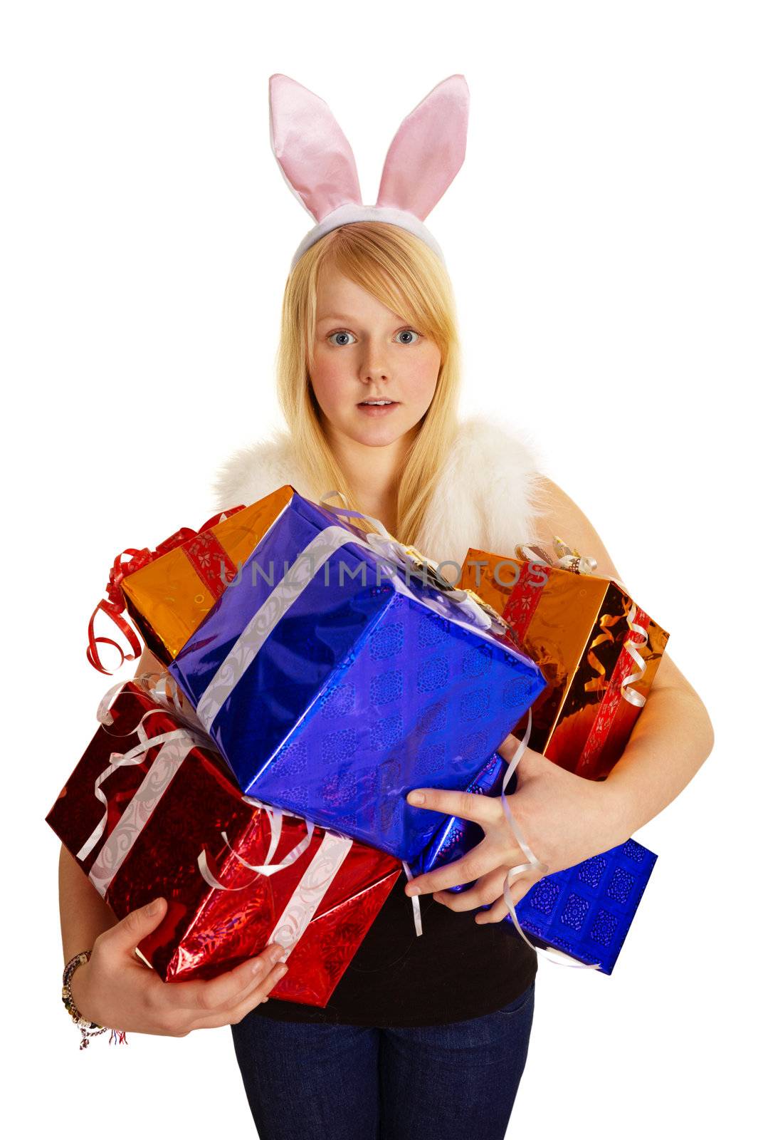 A young blonde in a bunny suit with a bunch of gifts isolated on white background