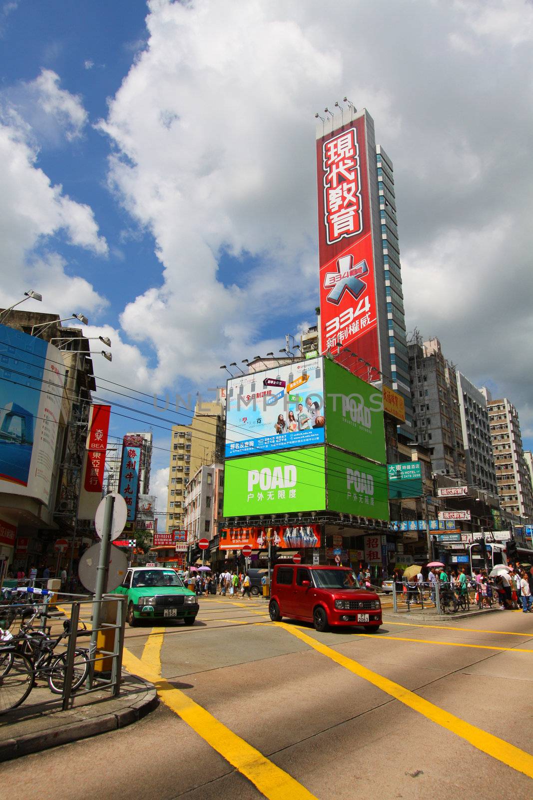 Busy traffic in Yuen Long downtown in Hong Kong by kawing921