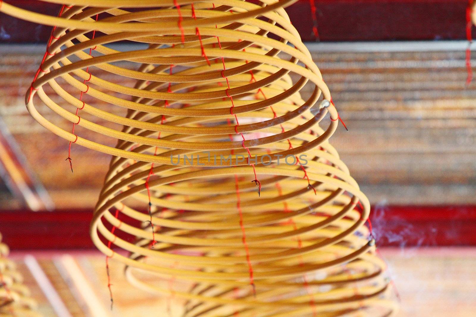 Incense coil in a Chinese temple by kawing921