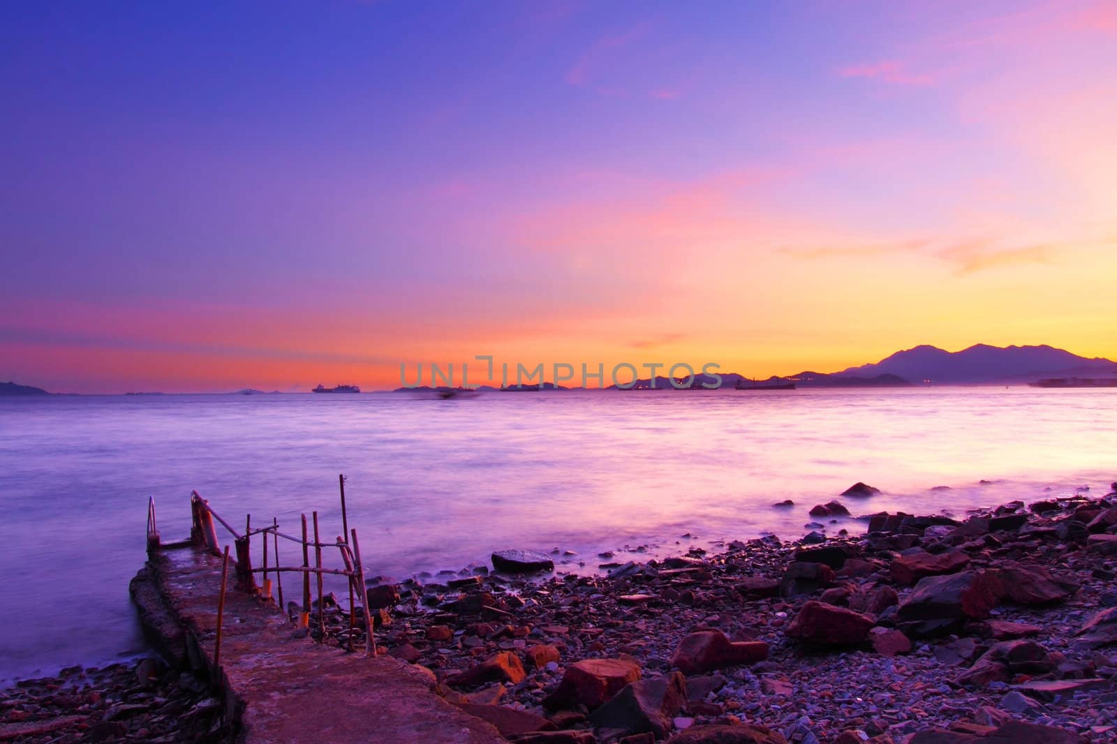 Sunset along the coast under long exposure