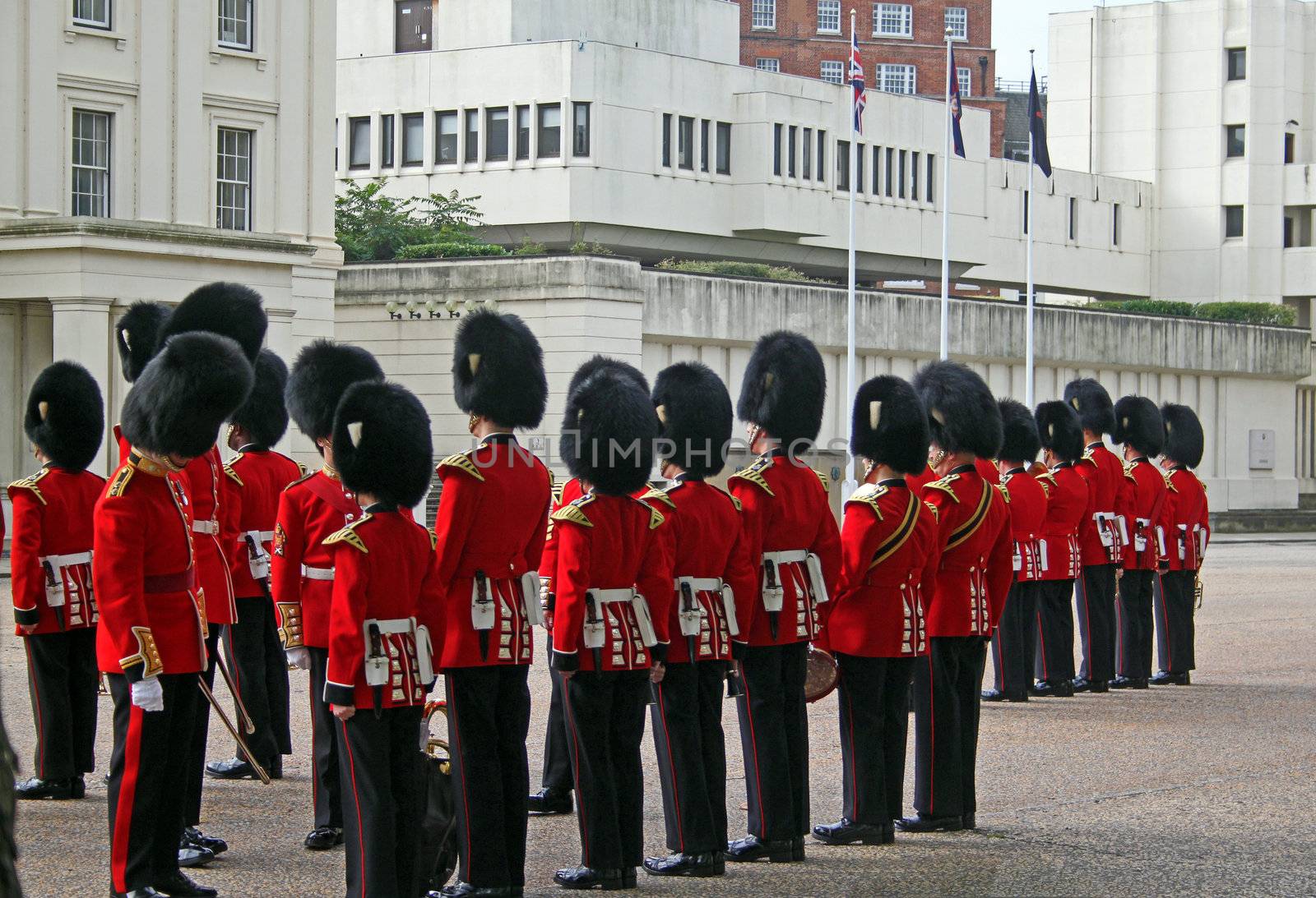 Grenadier guards at attention while inspection by officers