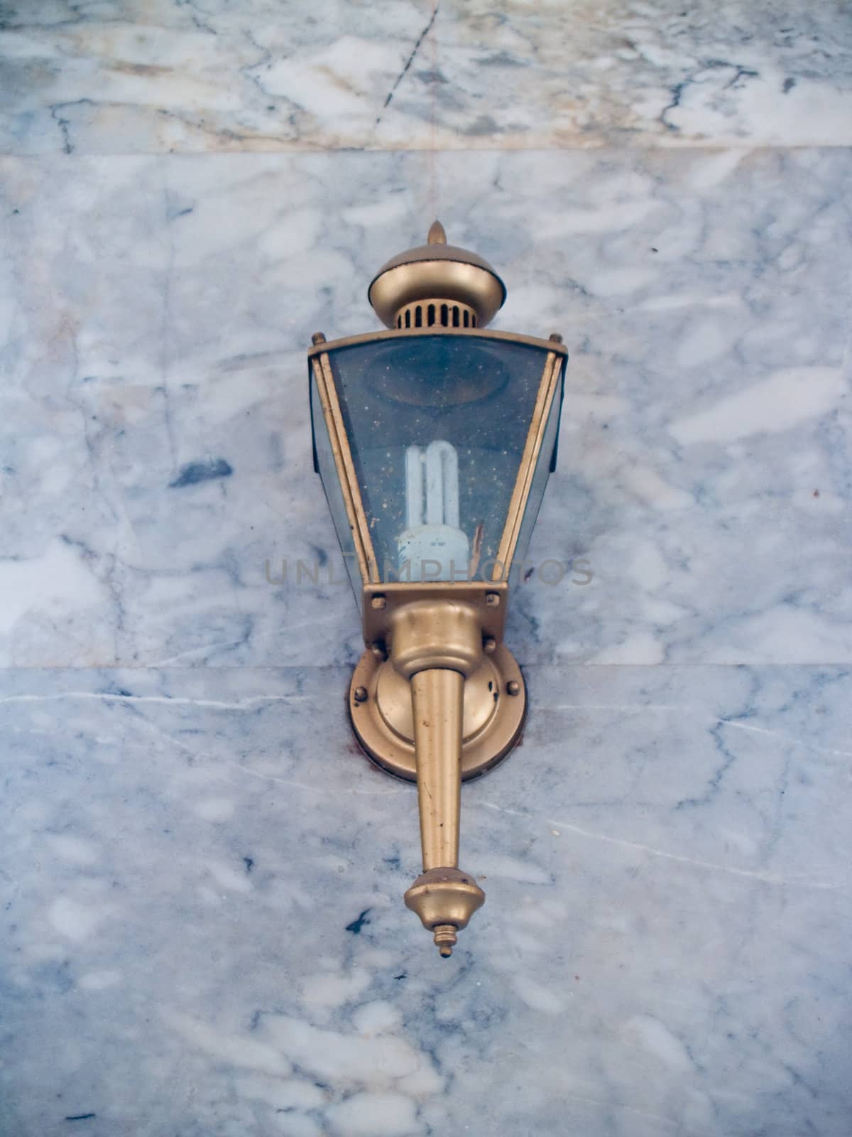 Wall lamp on marble wall