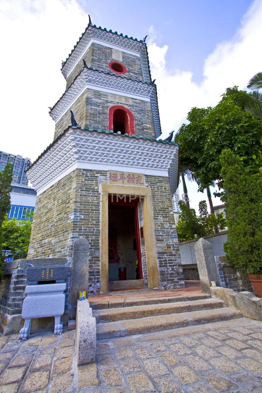 Tsui Sing Lau Pagoda (Hong Kong's only ancient pagoda) in Ping Shan Heritage Trail, Hong Kong.  Signposts can be found along the trail to guide the visitors. 