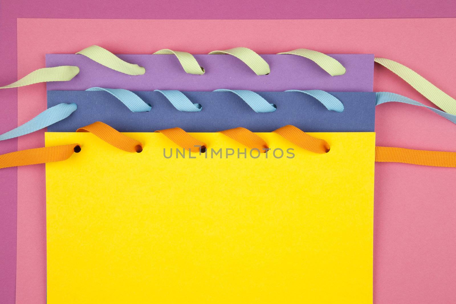colorful paper notes with ribbon
