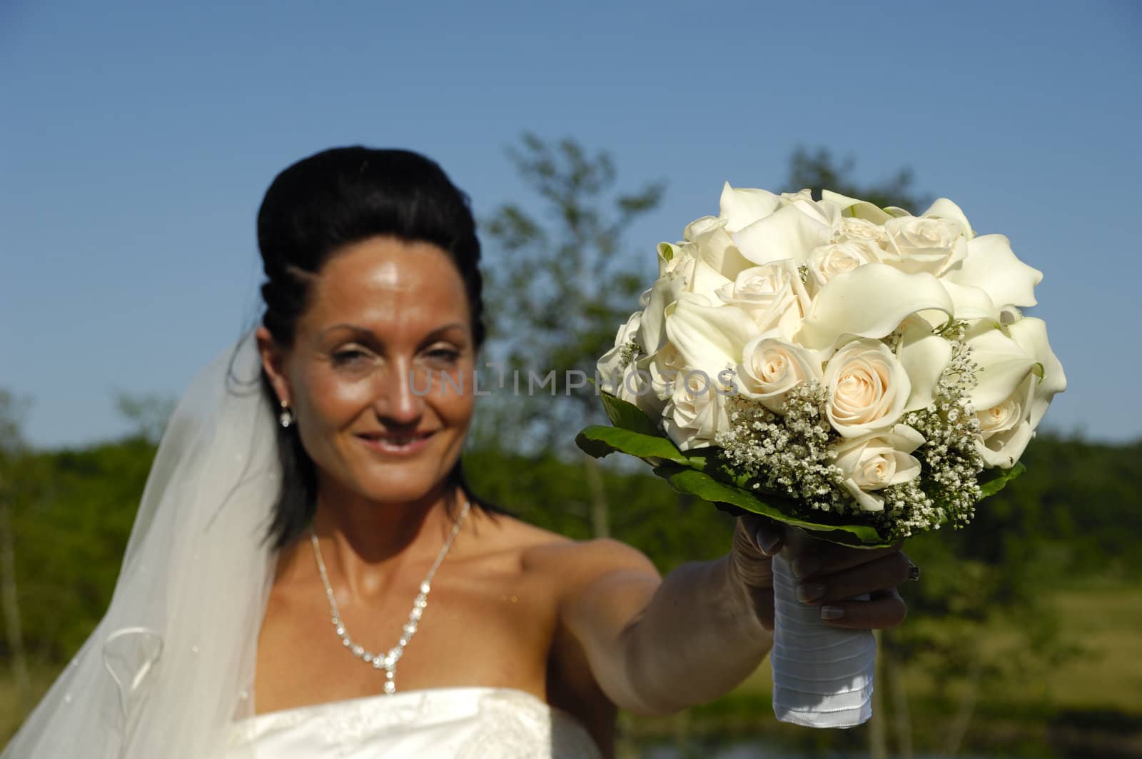 Bride with flower bouquet by cfoto