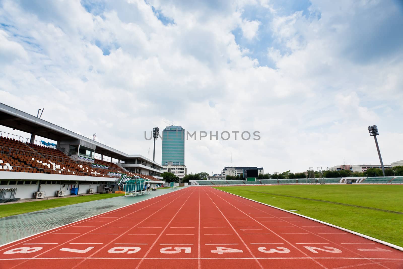 lanes of running track by Suriyaphoto