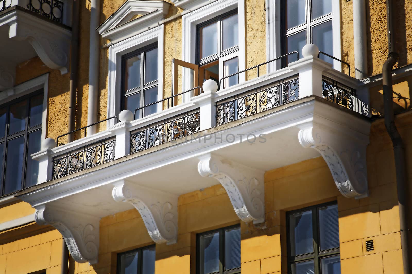 Lovely old house balcony with yellow wall
