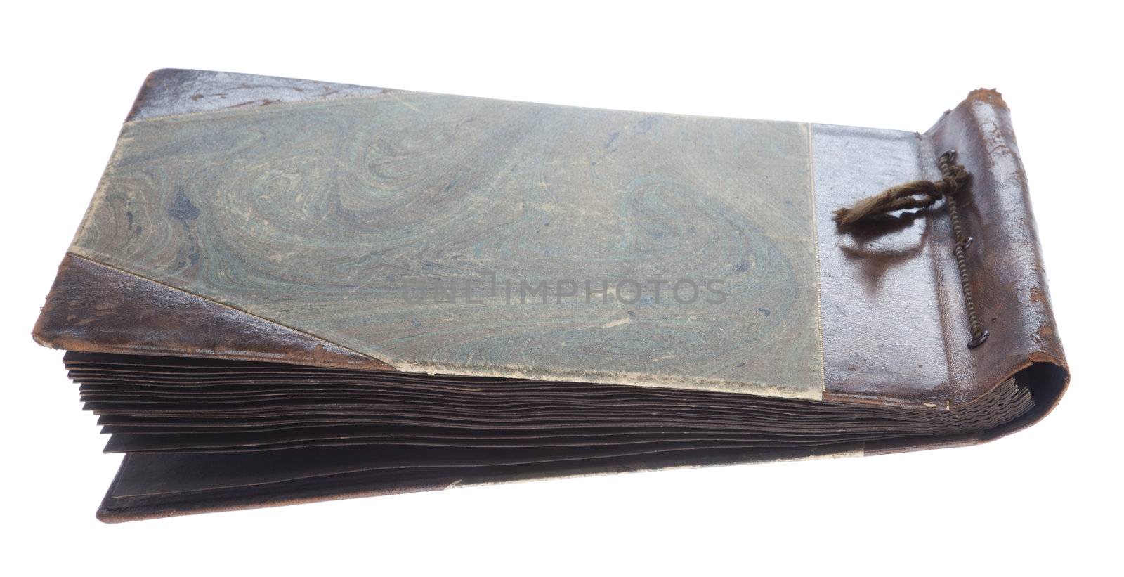 Old photo album with photos isolated on white. 