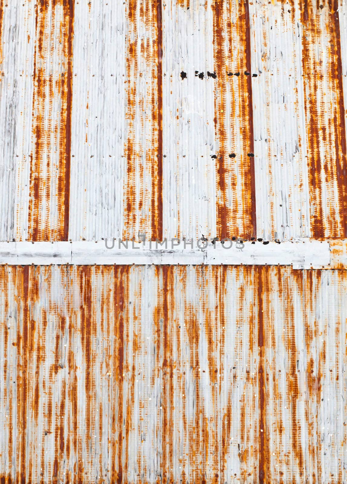 rusty corrugated iron by Suriyaphoto