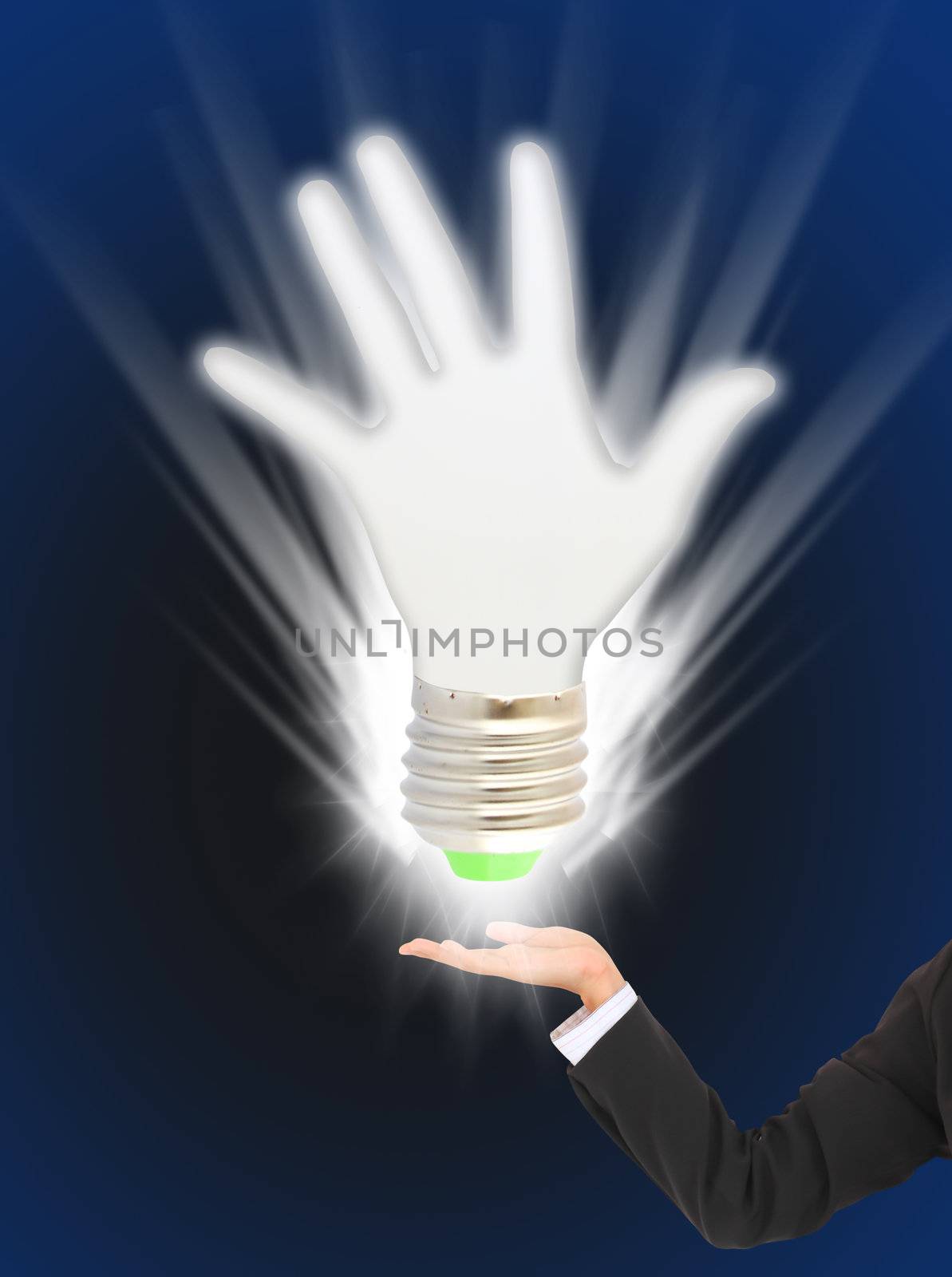 Eco green light bulb in business hand