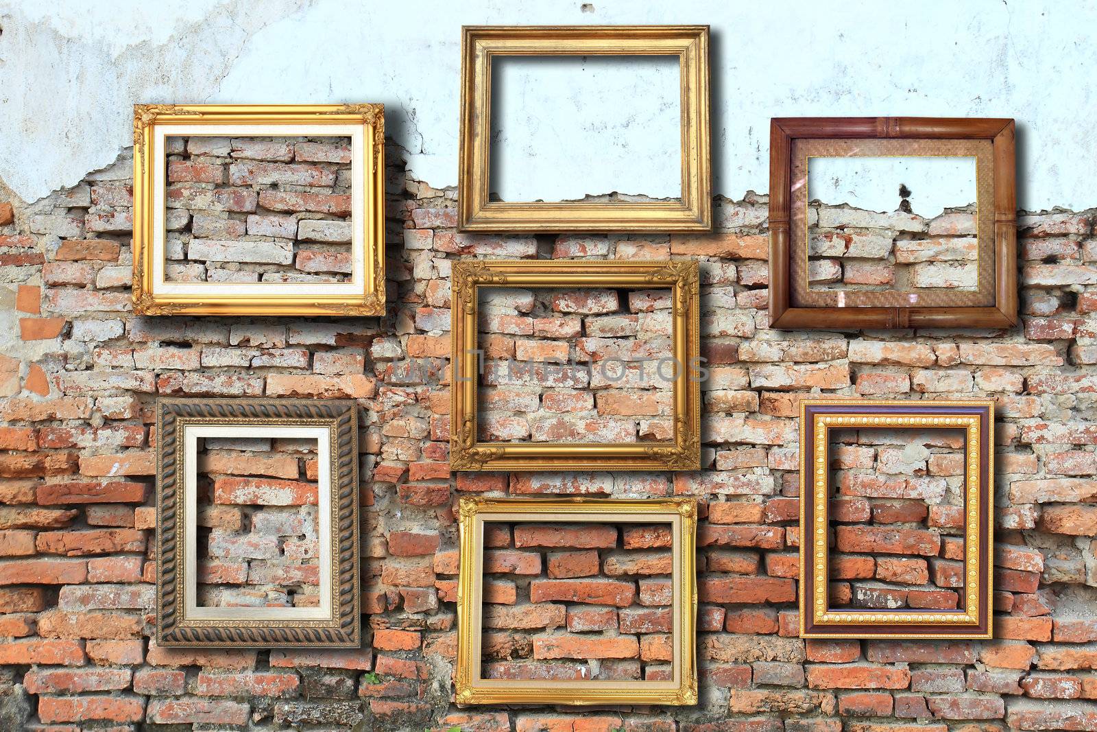 golden frame on old brick wall  by rufous