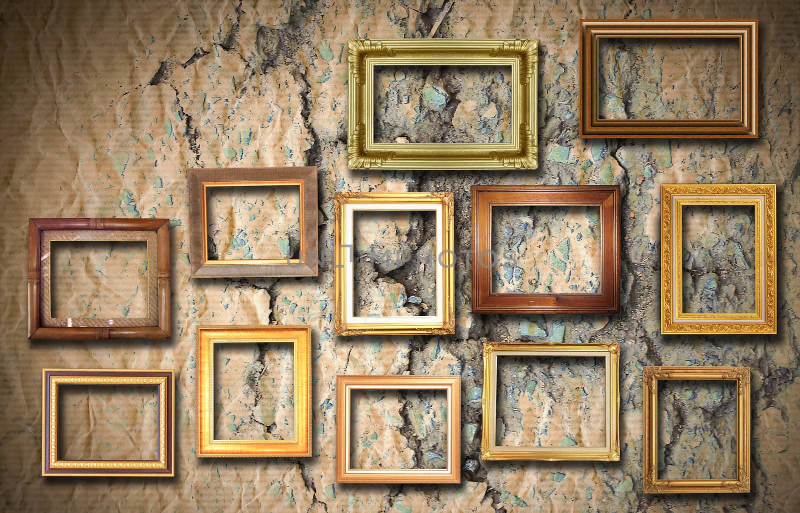 golden frame on old wall  by rufous