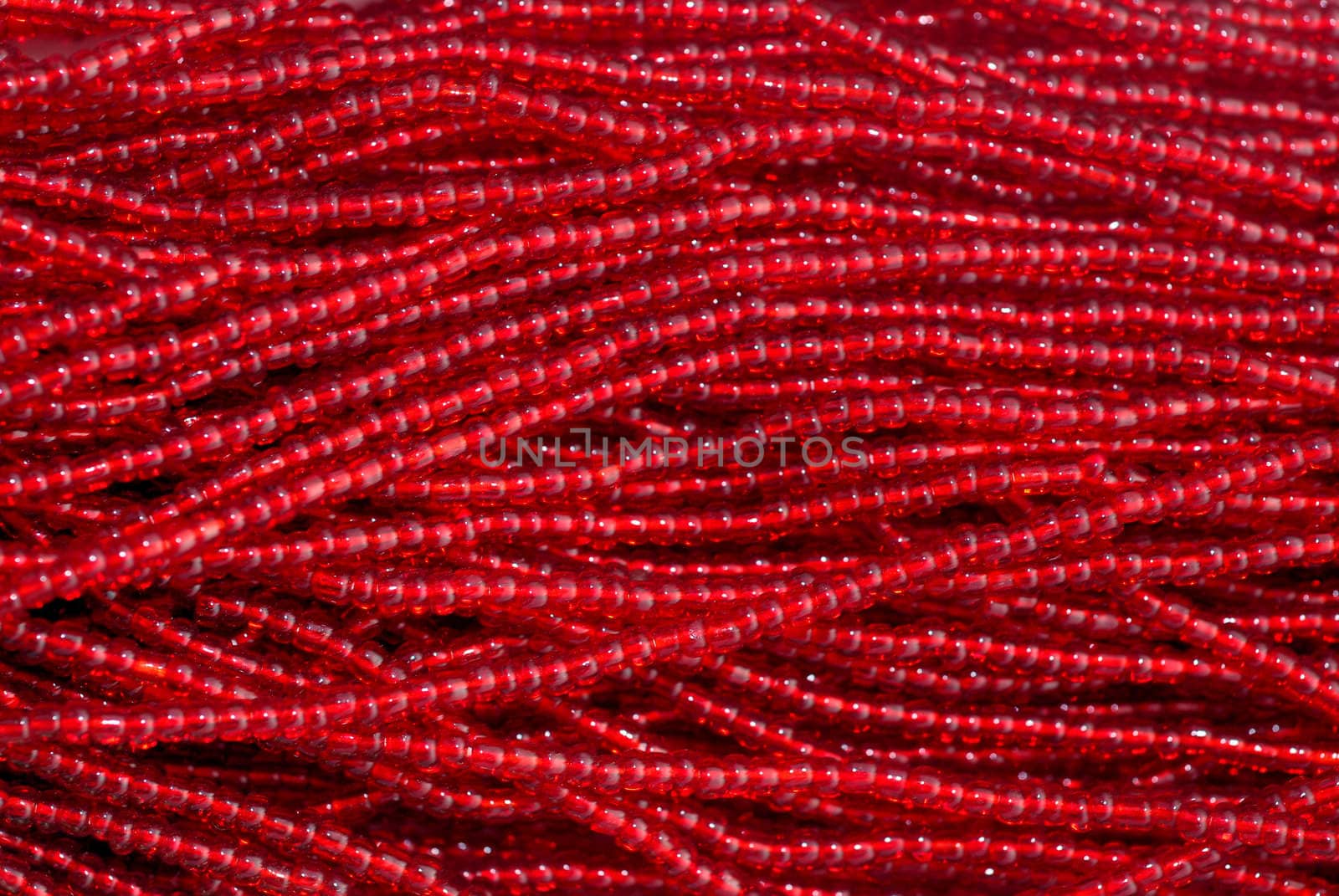 Indian fabric design with red beads texture 