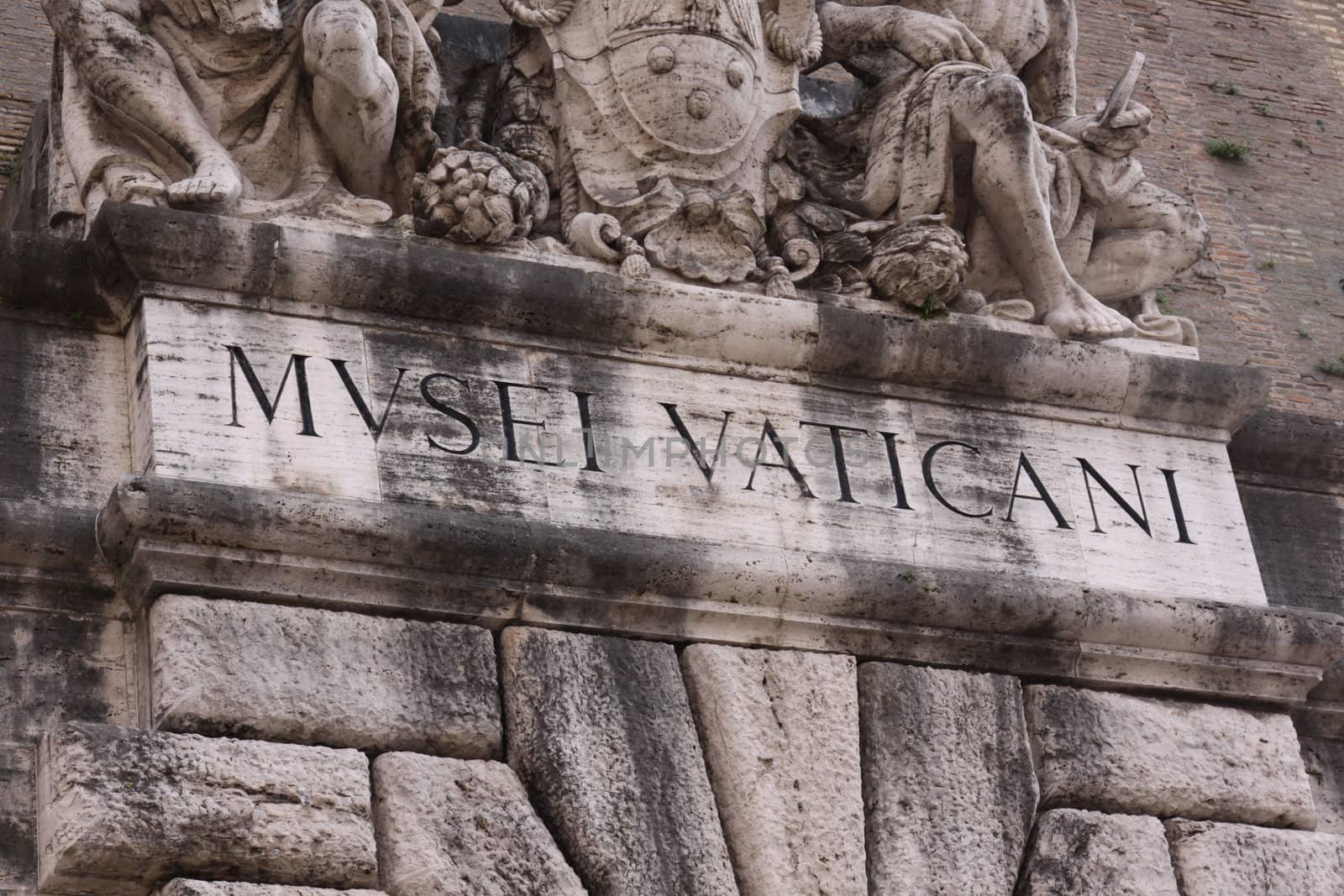 The lettering above the entrance to the Vatican Museums, in Rome, Italy.