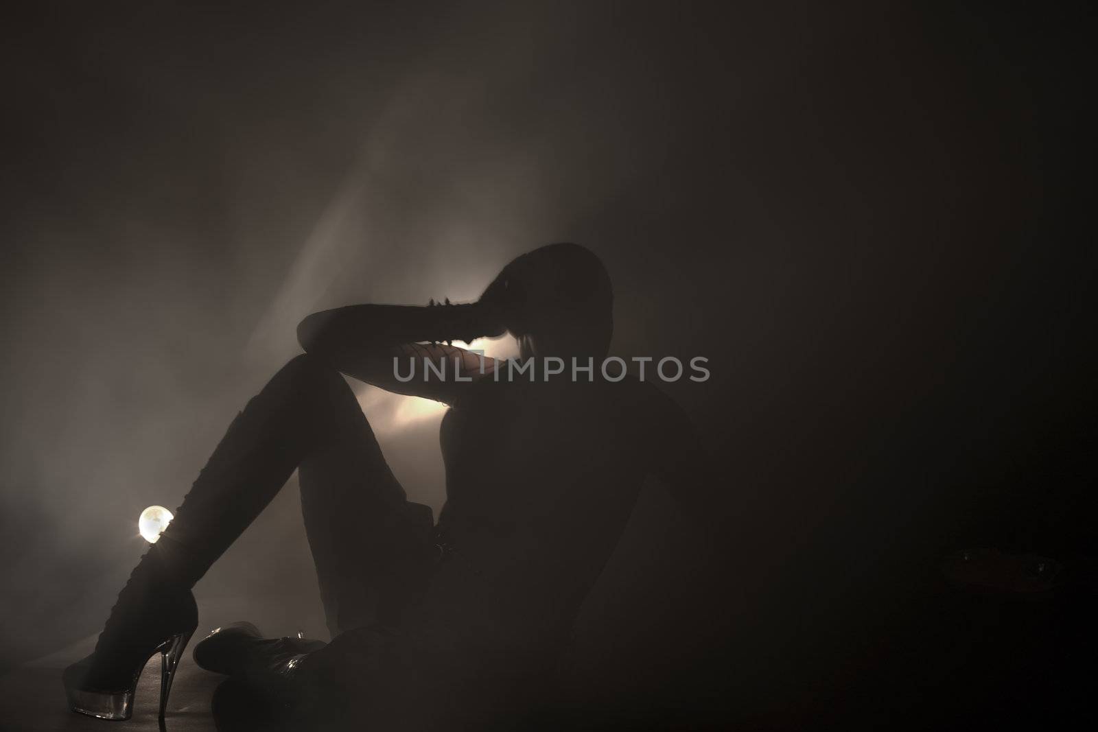 Light painted silhouette of a young alternative woman