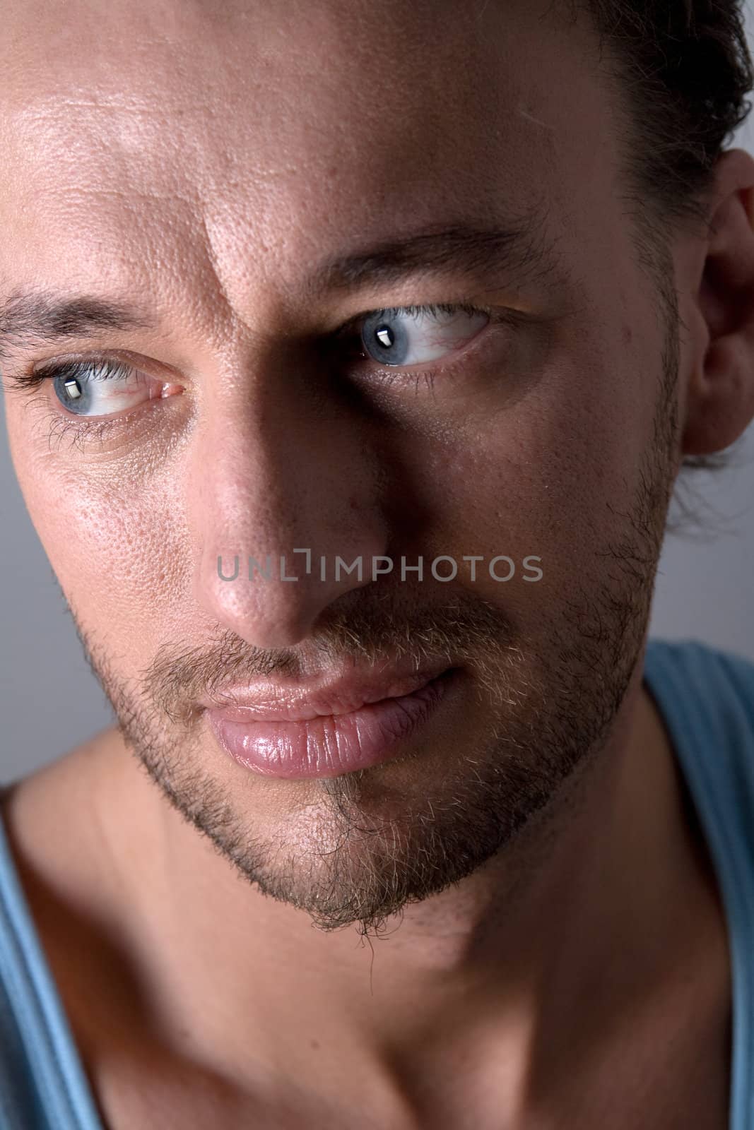 Studio portrait of a young adult man