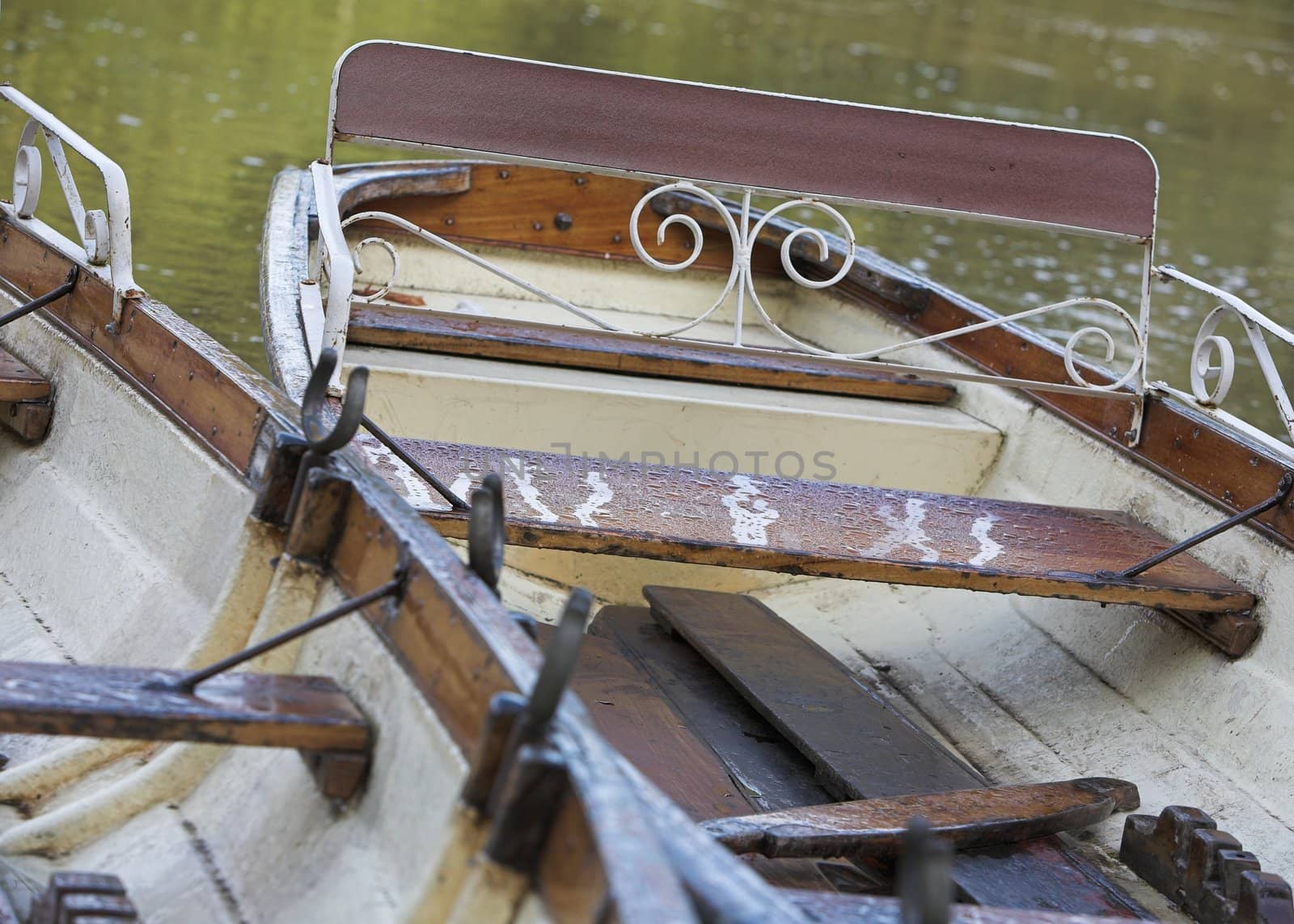 Old rowing boats moored in a marina.