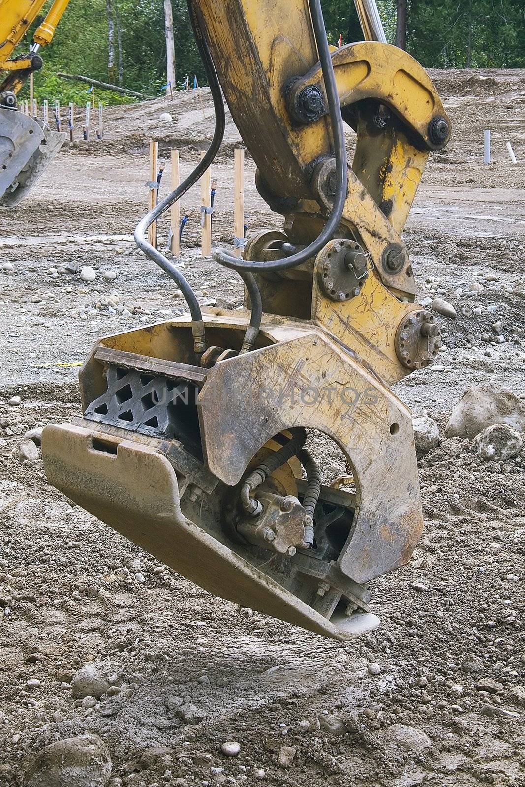A heavy duty tamper at a construction site.