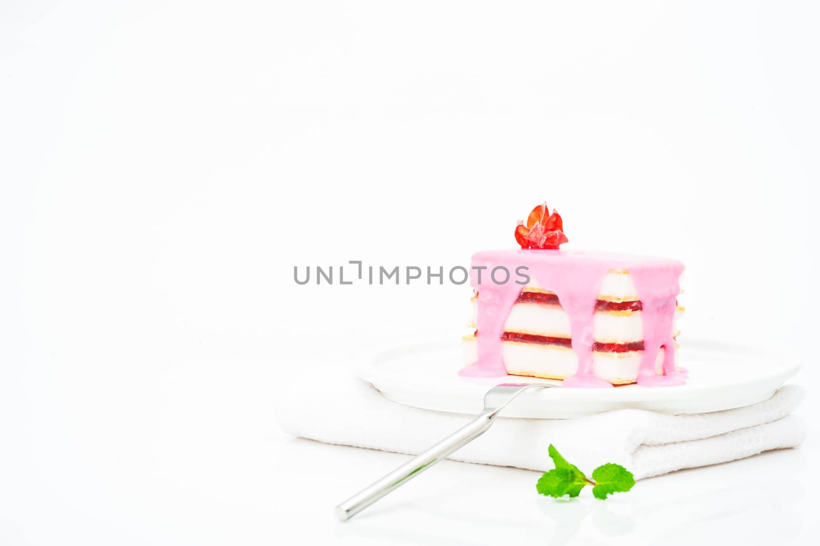 Small cakes with a pink icing