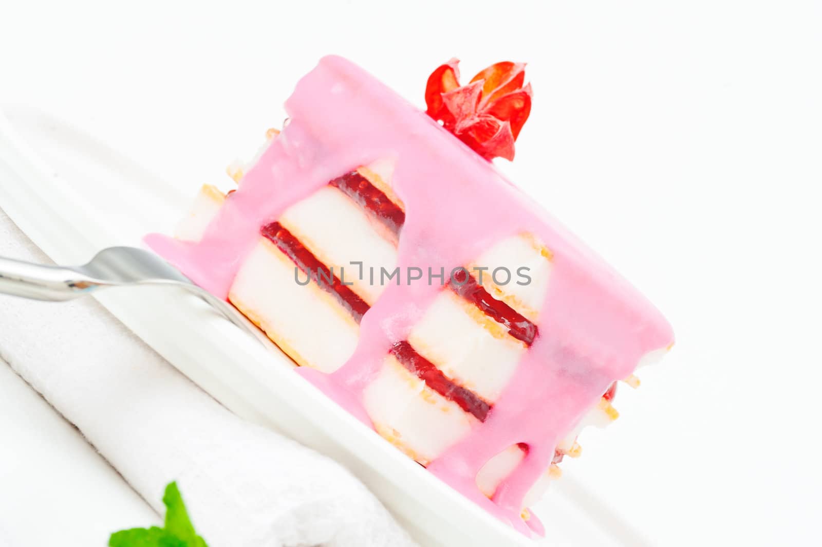 Small cakes with a pink icing