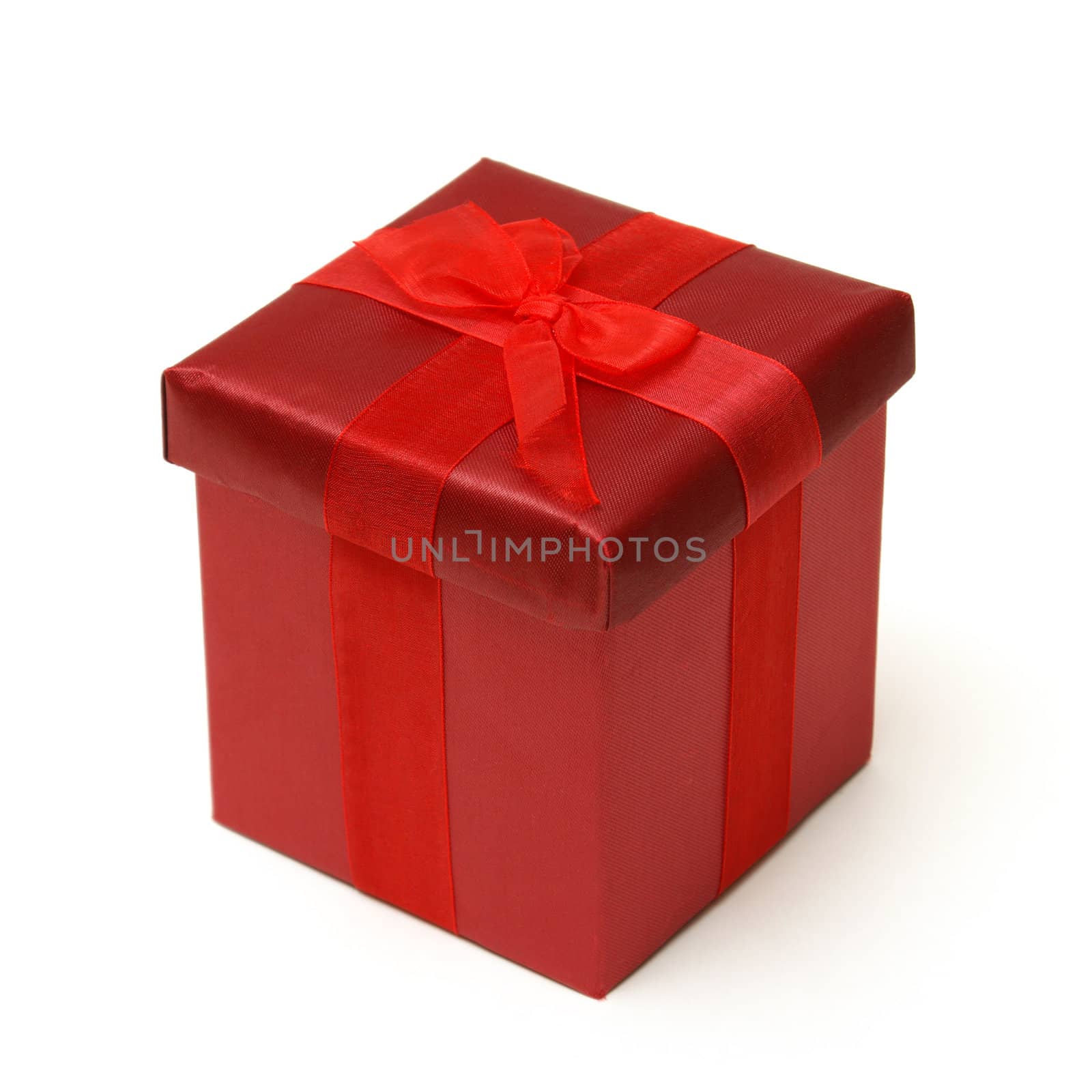 An isolated shot of a red gift box for that special occasion.