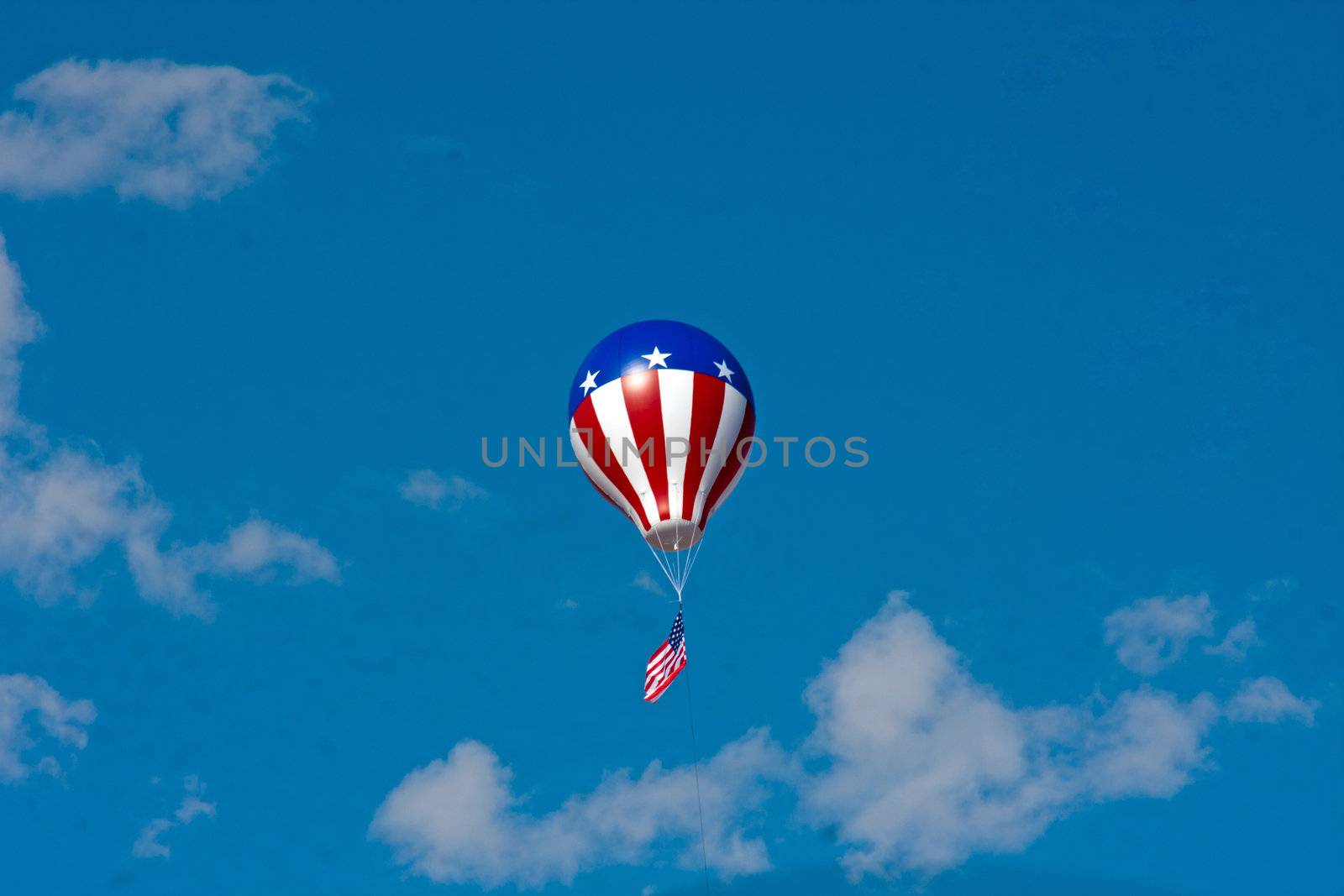 4th of July balloon against blue sky by GunterNezhoda