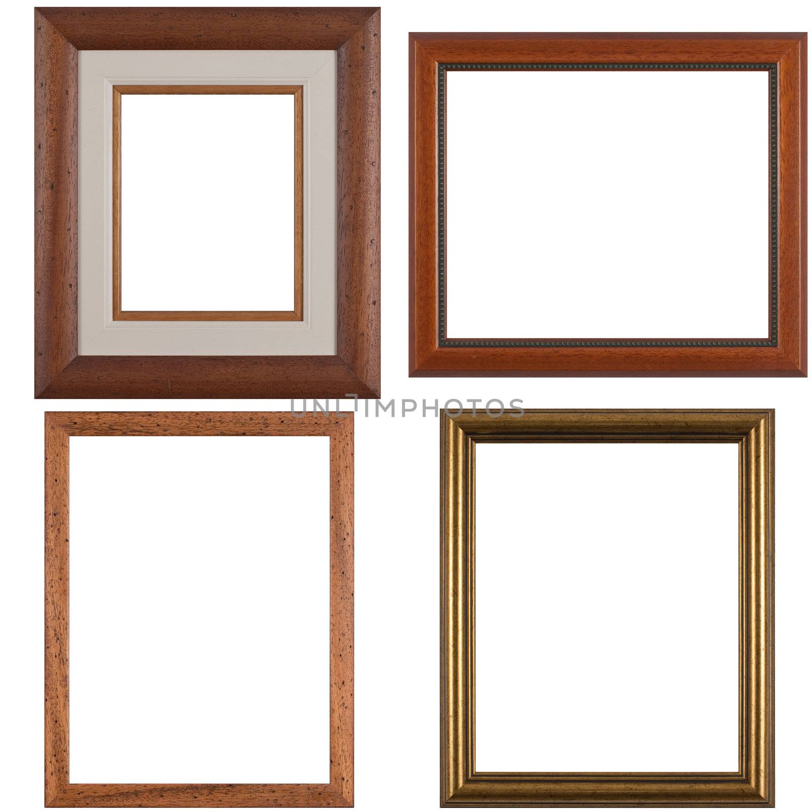 Four antique picture frames isolated on white background.