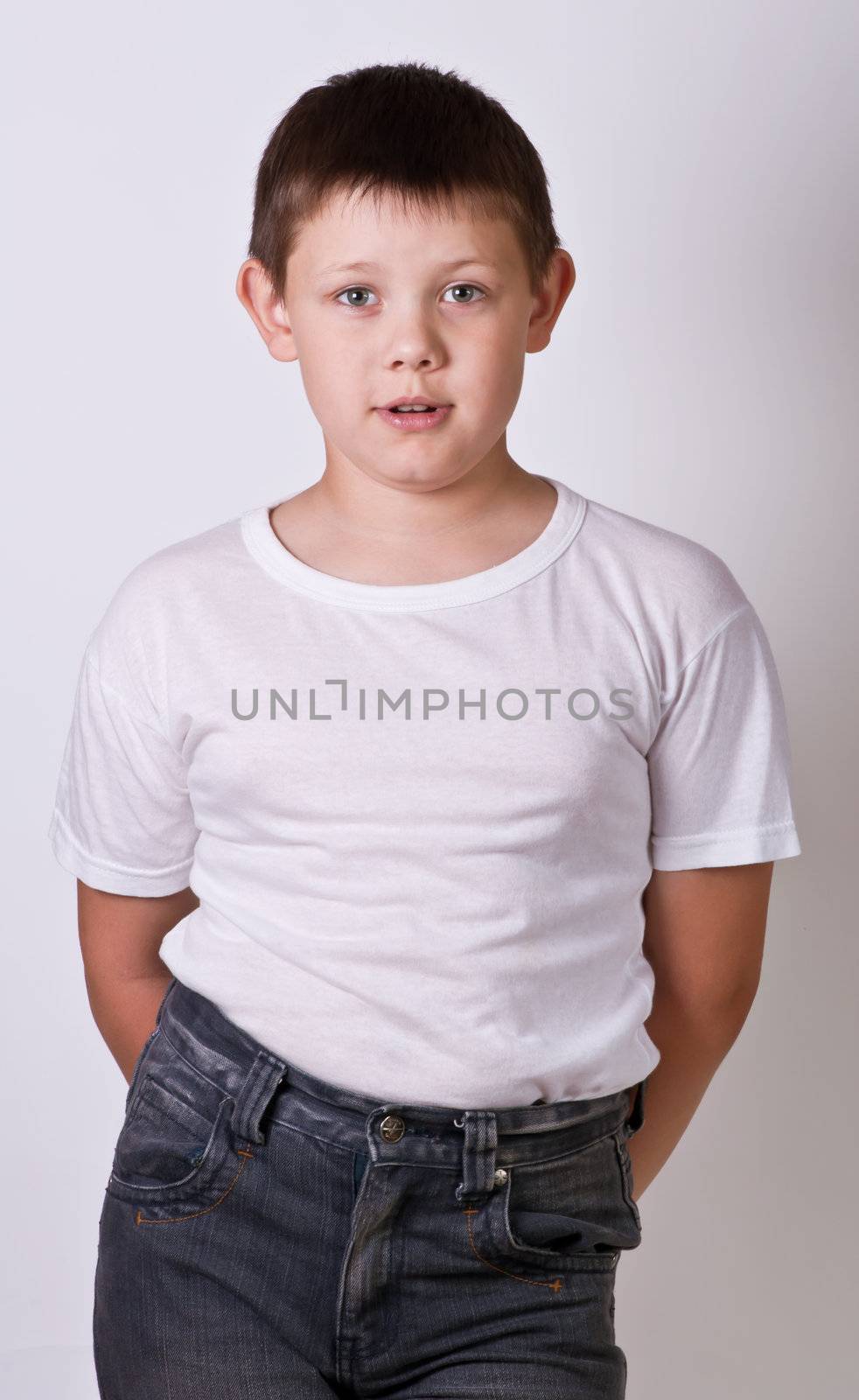 Portrait of emotionally kid. Funny little boy. Beautiful caucasian model.