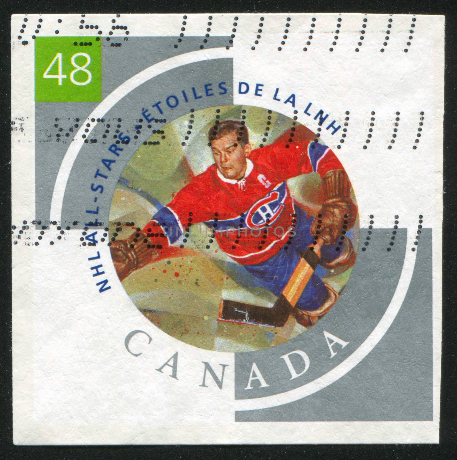 CANADA - CIRCA 2003: stamp printed by Canada, shows hockey player, circa 2003