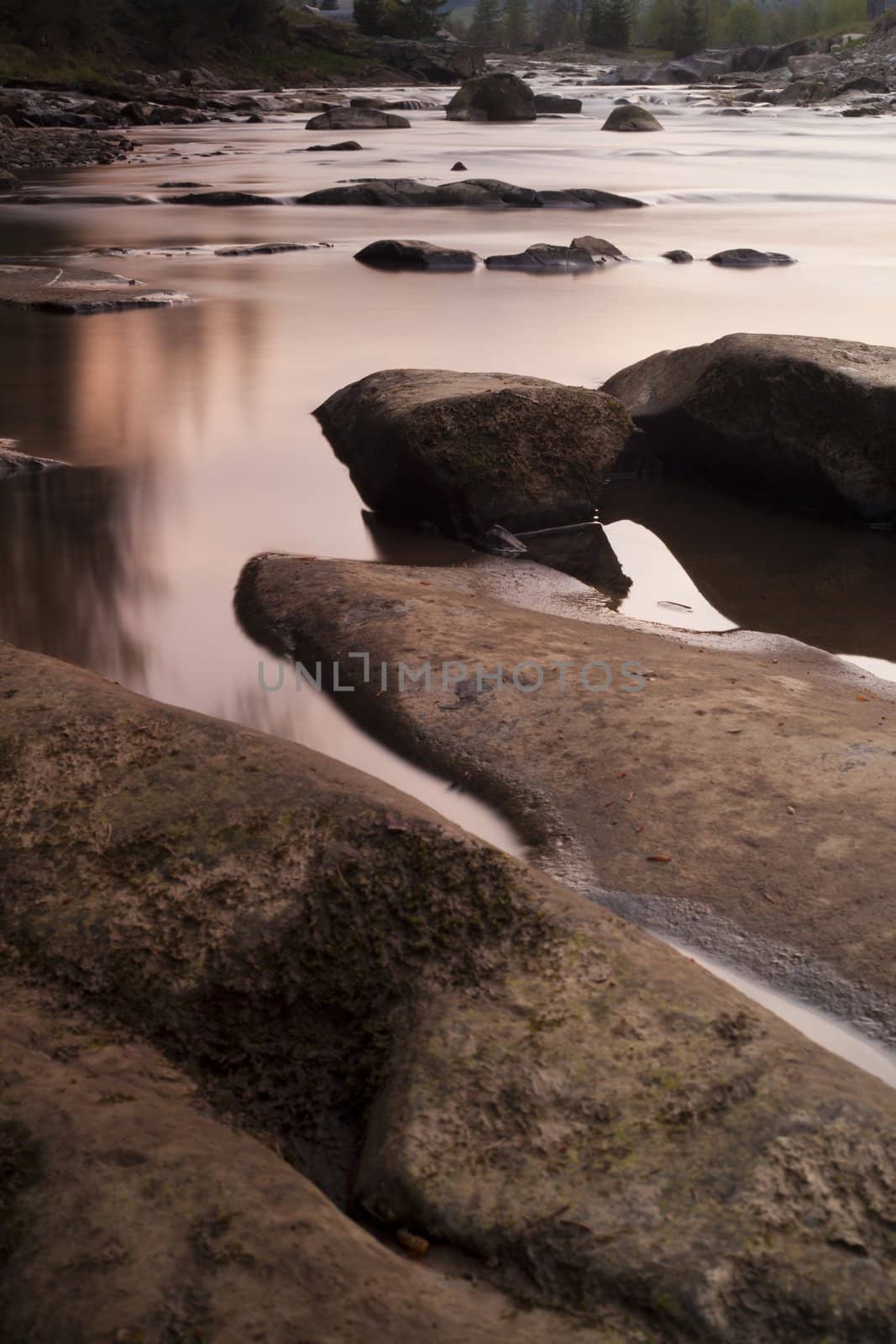 Beautiful river landscape during the sunset. Vertical