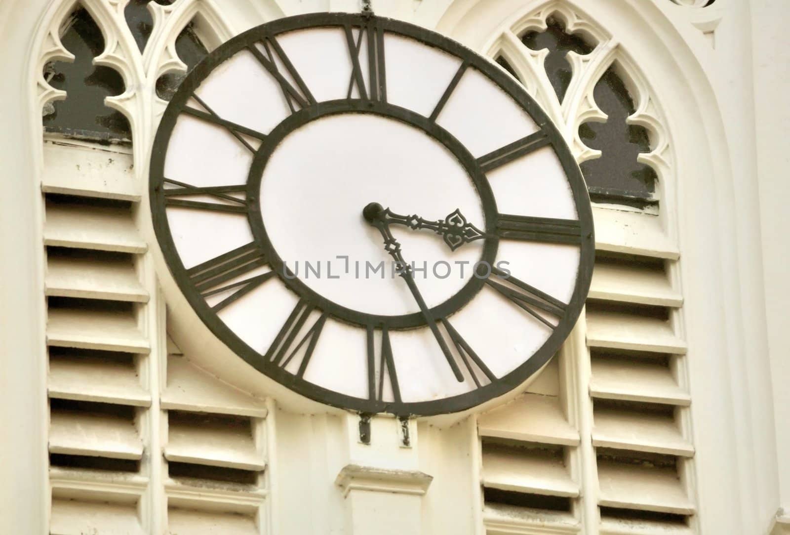 A old clock on the wall of the tower of St. Paul's Cathedral, Calcutta