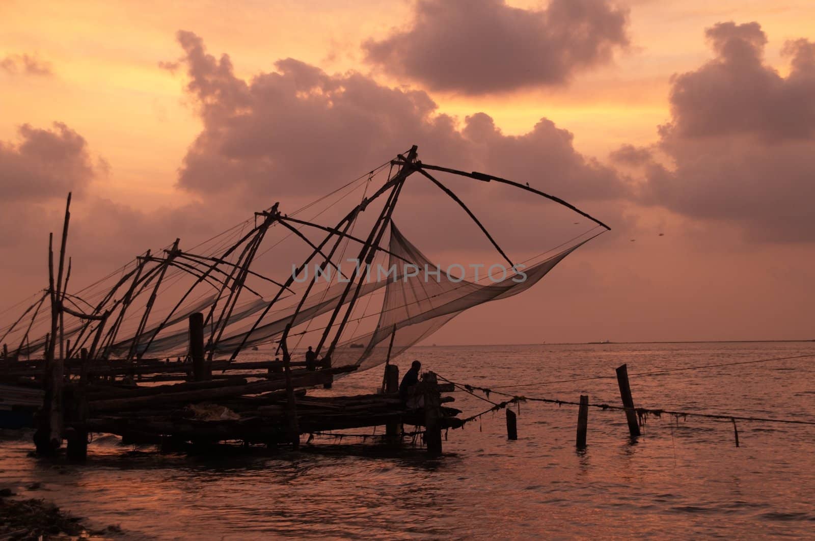 Chinese fishing nets lining the shore at Fort Kochi, Kerala, India
