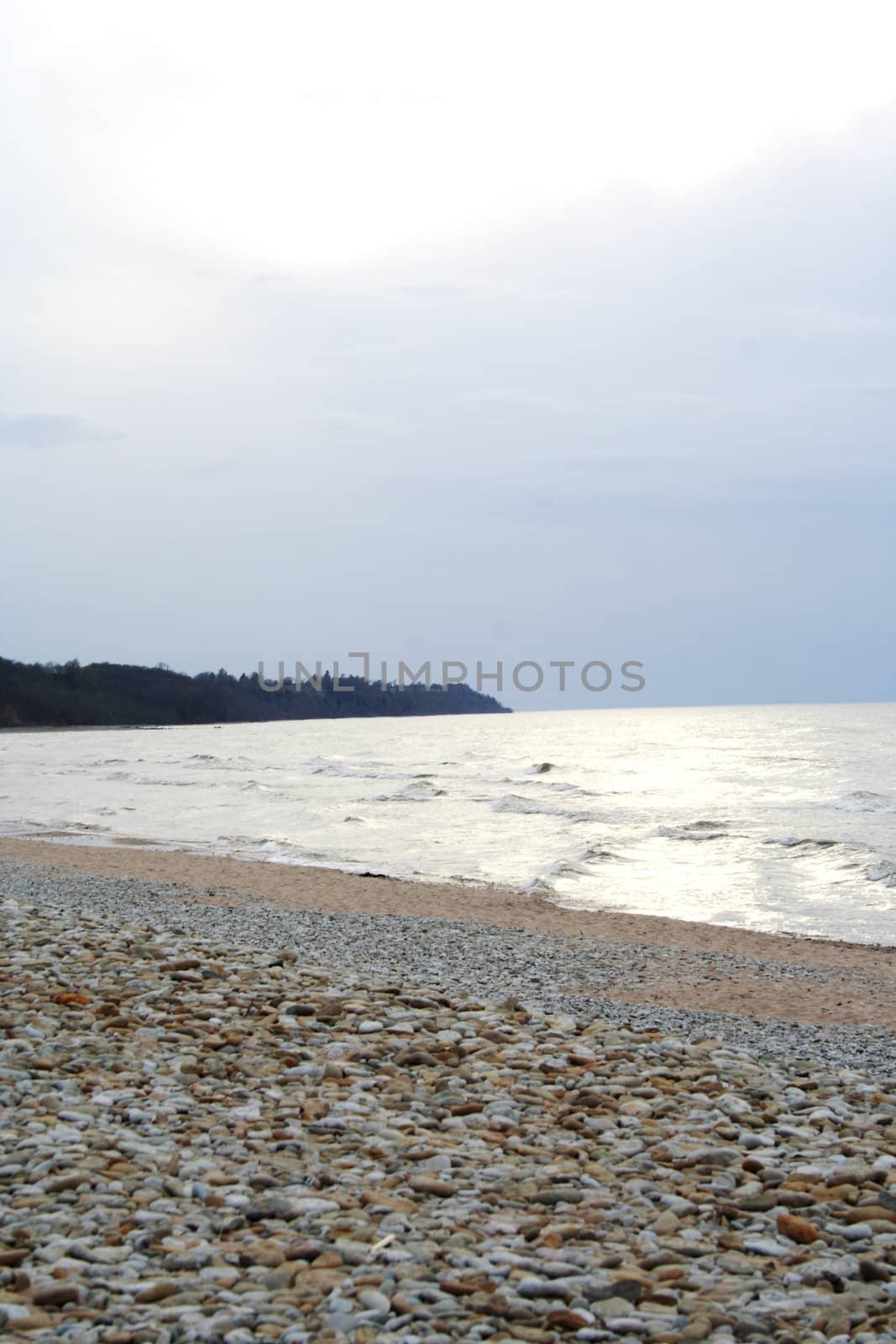 Photo shot of the stone beach in evening