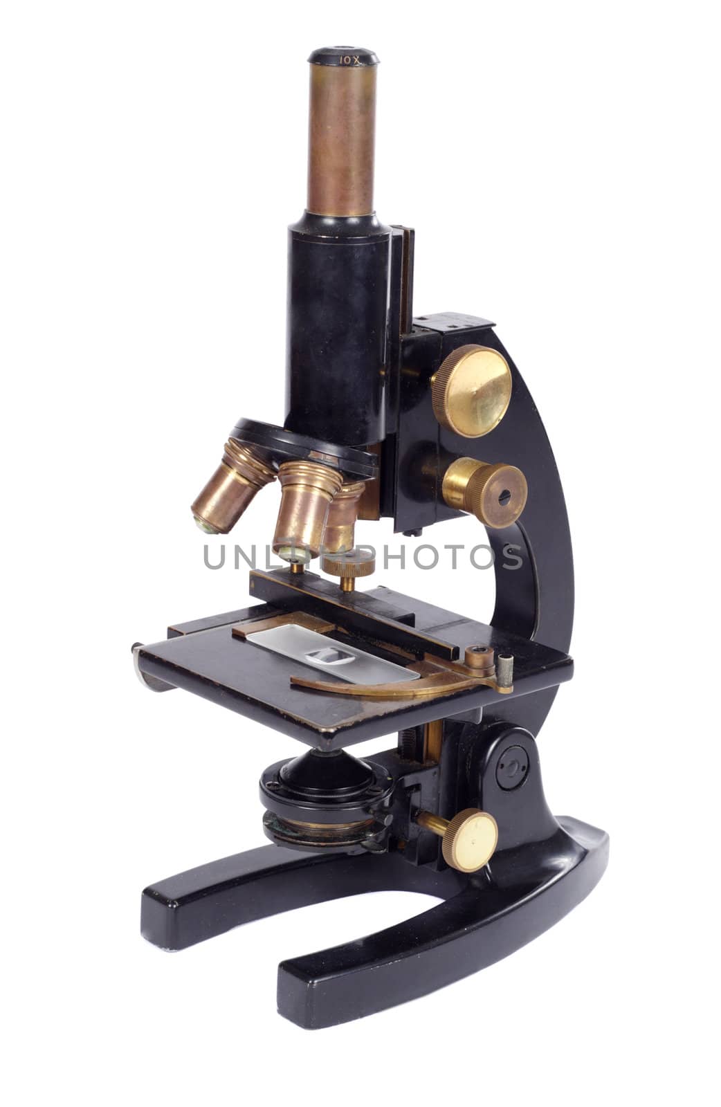 old microscope photo on the white background