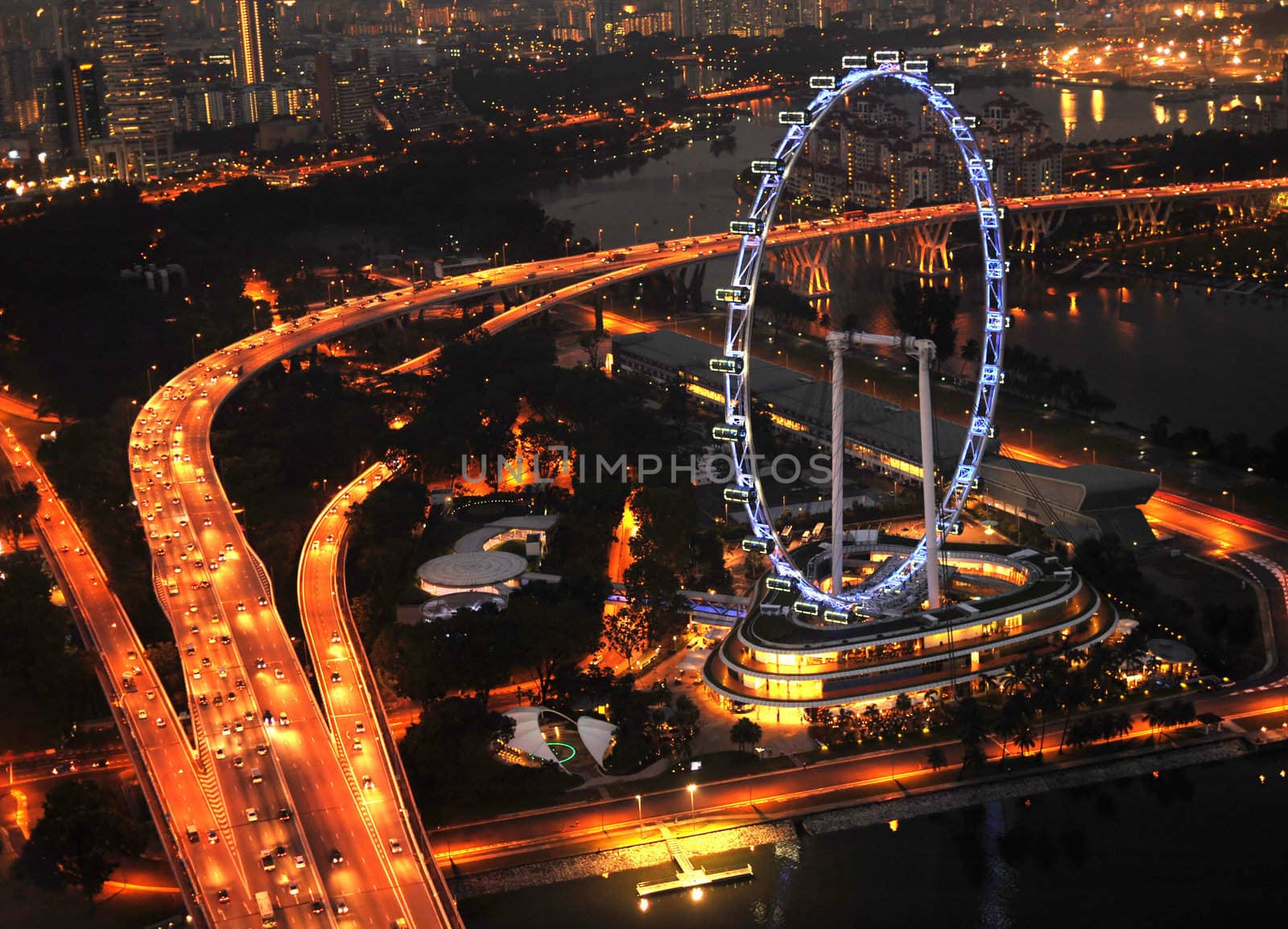 Aerial view on Singapore Flyer from Marina Bay Sands resort at night