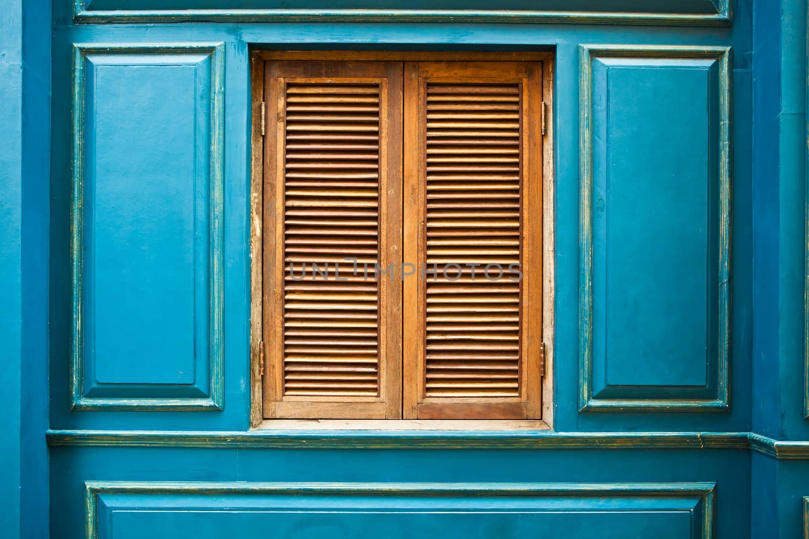 green wooden and window by Suriyaphoto