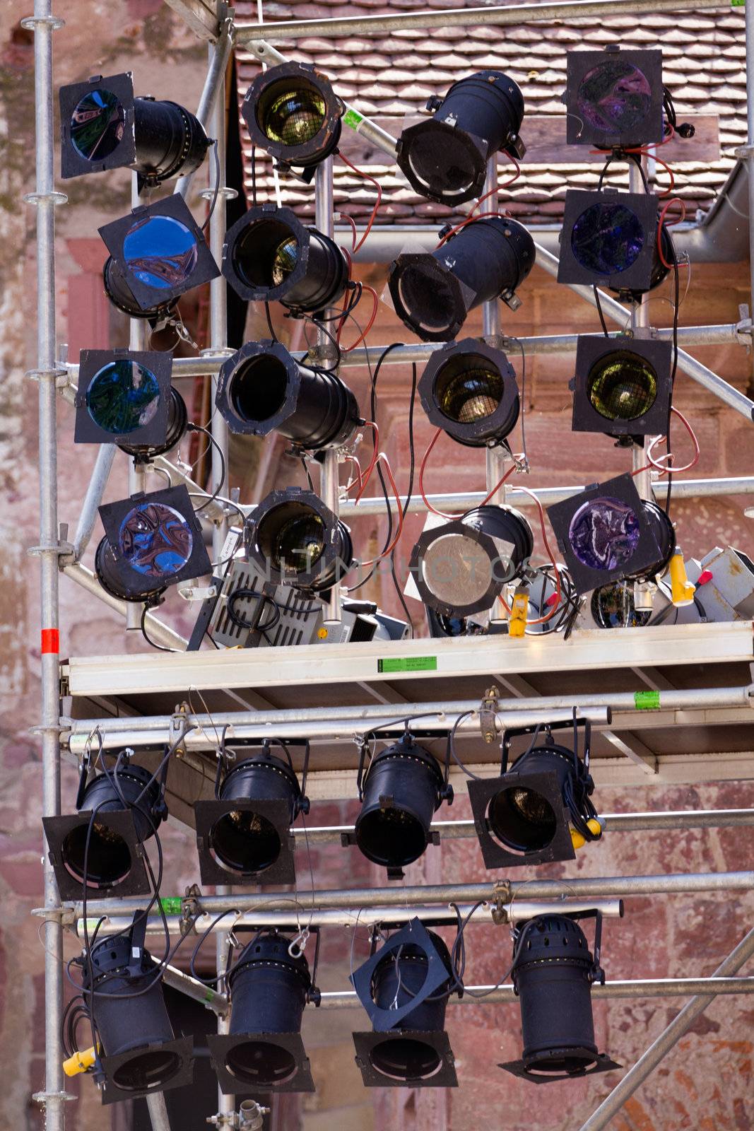 Event lights and spotlamps on a metal frame ready for a show