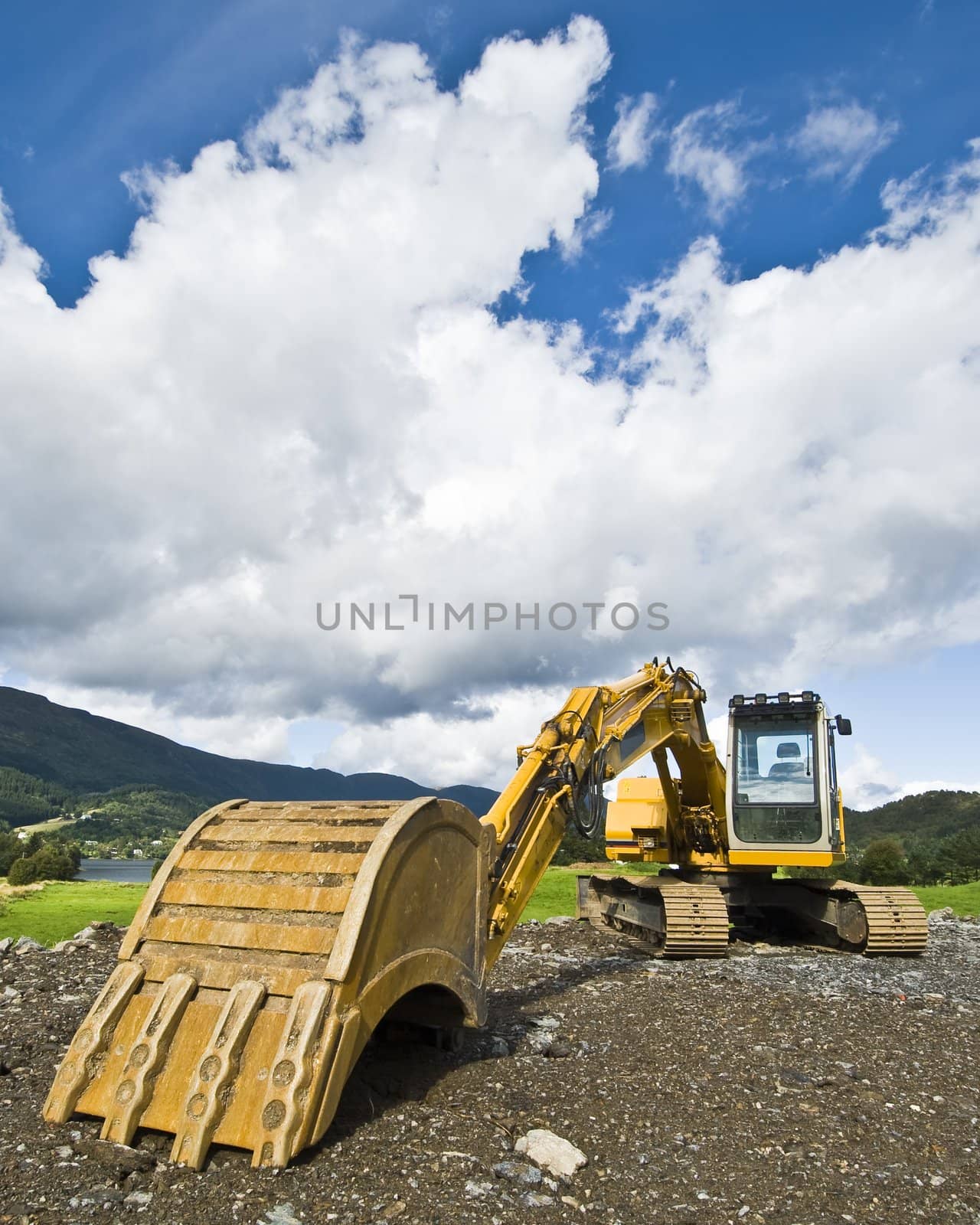 Earthmover parked in rural surroundings