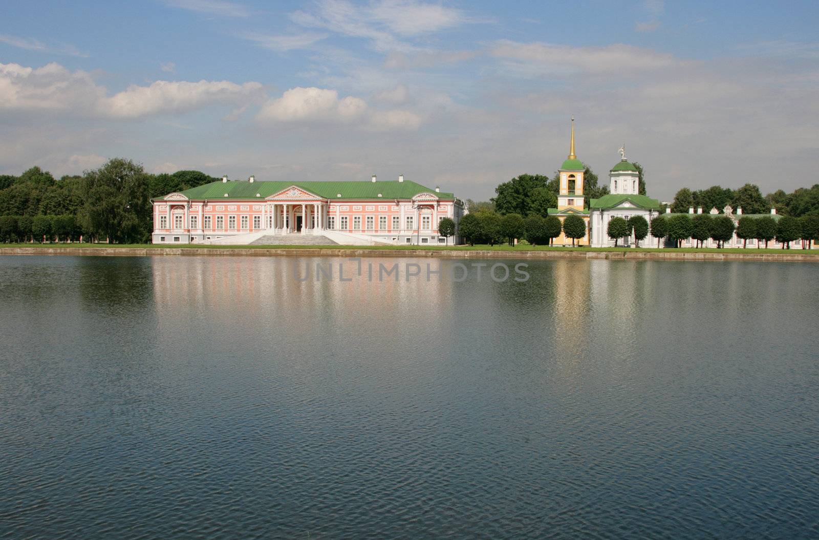 Old rich manor on coast of a reservoir